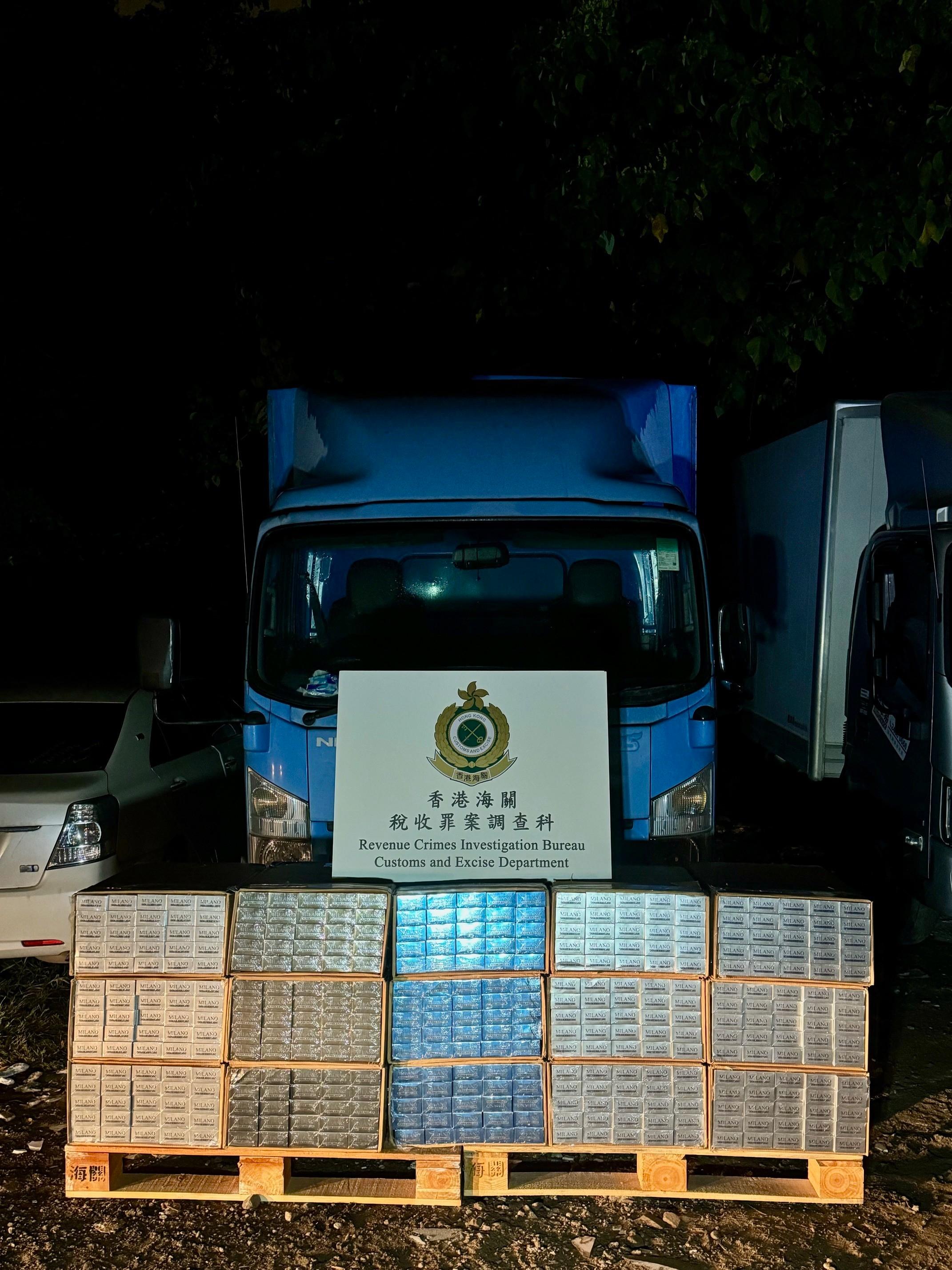 Hong Kong Customs yesterday (March 5) raided suspected illicit cigarette mobile storage centres in Yuen Long and seized about 1.03 million suspected illicit cigarettes with an estimated market value of about $4.6 million and a duty potential of about $3.4 million. Among them, about 1.02 million of the seized illicit cigarettes were "cheap whites", accounting for about 99 per cent of the total seizure. Photo shows one of the vehicles suspected to be used for storing and distributing illicit cigarettes. 




