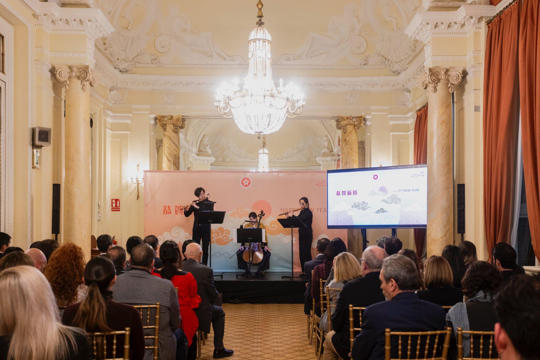 Flutists Tsang Yat-ho and Wong Nga-ting and cellist Iris Werhahn perform a repertoire of Chinese and Spanish songs at the Chinese New Year reception in Madrid on March 3 (Madrid time).