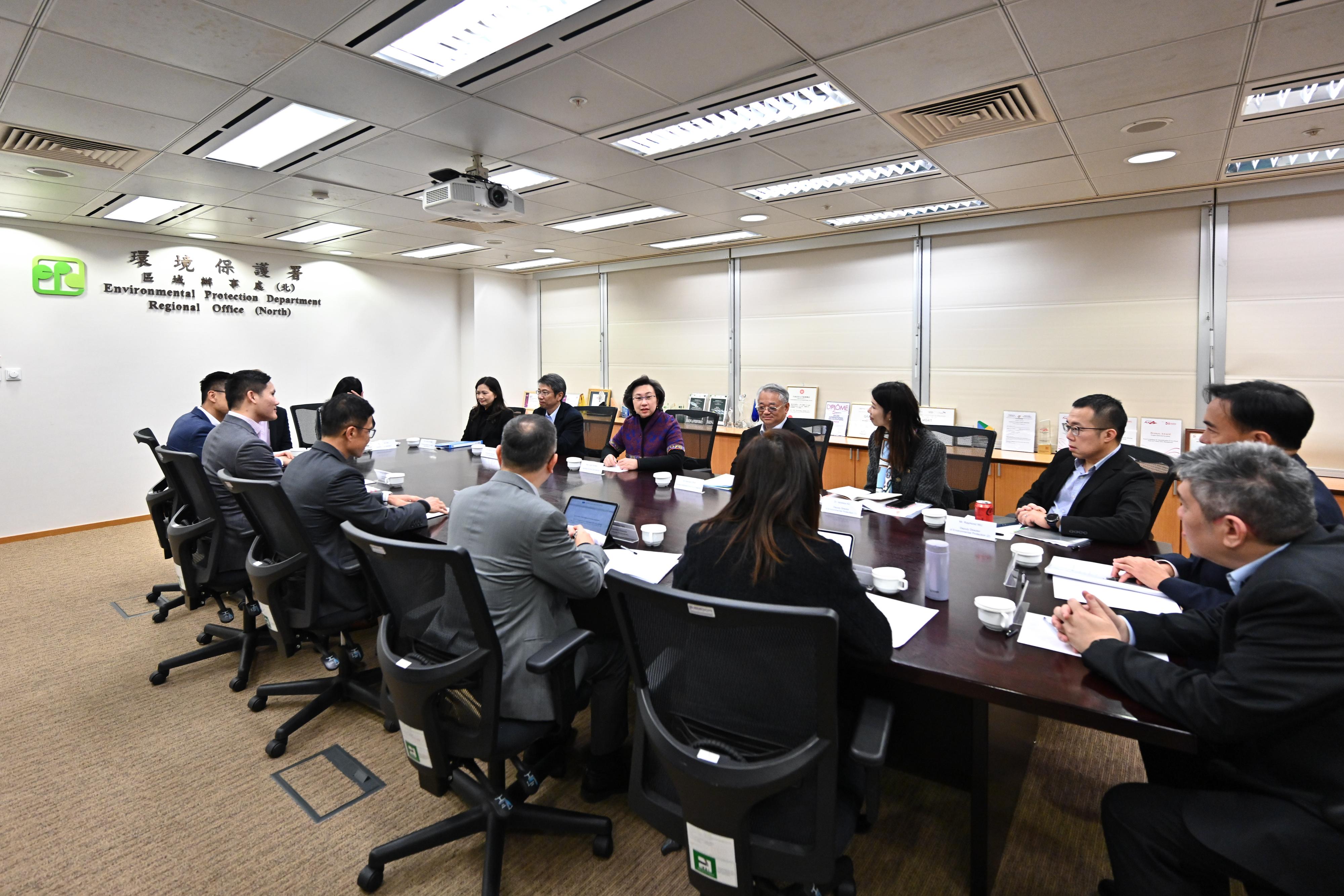 The Secretary for the Civil Service, Mrs Ingrid Yeung, visited the Environmental Protection Department this afternoon (March 7). Photo shows Mrs Yeung (back row, third left) meeting with the Director of Environmental Protection, Dr Samuel Chui (back row, fourth left), and the directorate staff to receive an update on the department's latest developments in various areas of work. Looking on is the Permanent Secretary for the Civil Service, Mr Clement Leung (back row, second left).