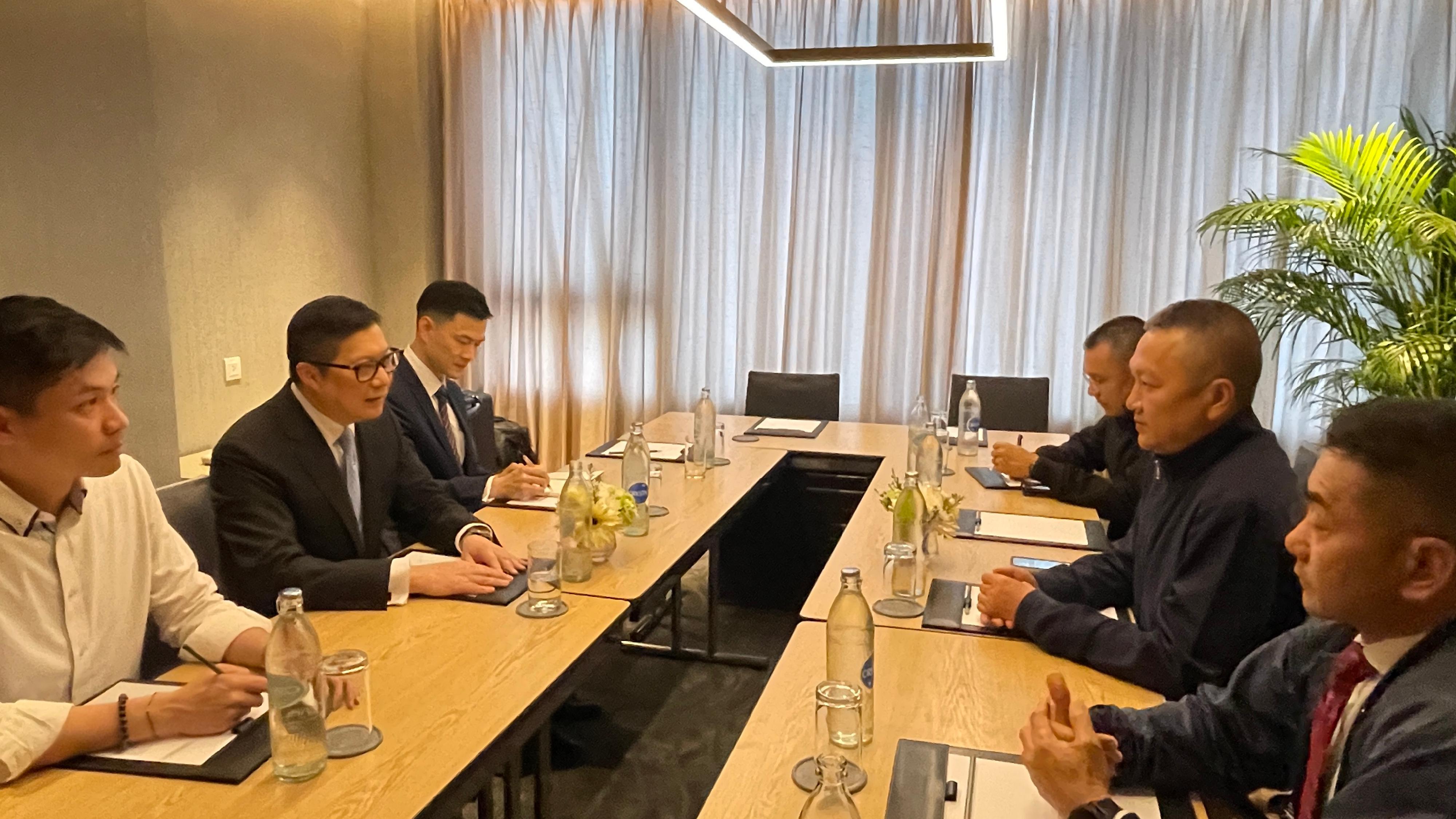 The Secretary for Security, Mr Tang Ping-keung, departed for Thailand earlier to participate in the co-ordination and rescue operation for six Hong Kong residents who were lured to Myanmar to engage in illegal work. Mr Tang returned to Hong Kong today (March 7). Photo shows Mr Tang (second left) meeting with Thailand's Senior Inspector General Mr Thatchai Pitaneelaboot (second right) in Thailand.