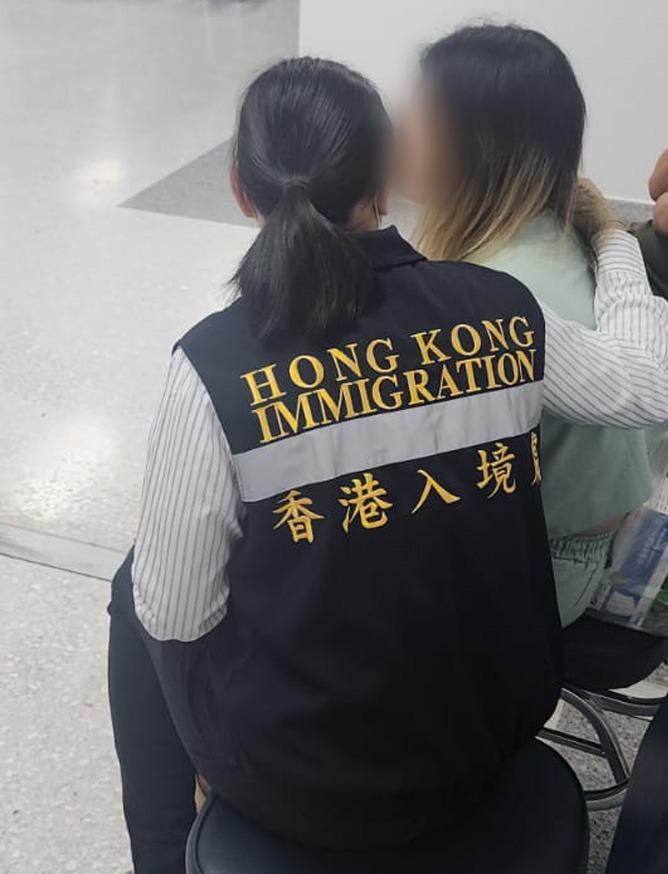 The Secretary for Security, Mr Tang Ping-keung, departed for Thailand earlier to participate in the co-ordination and rescue operation for six Hong Kong residents who were lured to Myanmar to engage in illegal work. Mr Tang returned to Hong Kong today (March 7). Photo shows a member of the dedicated task force (left) meeting with one of the rescued Hong Kong residents (right).