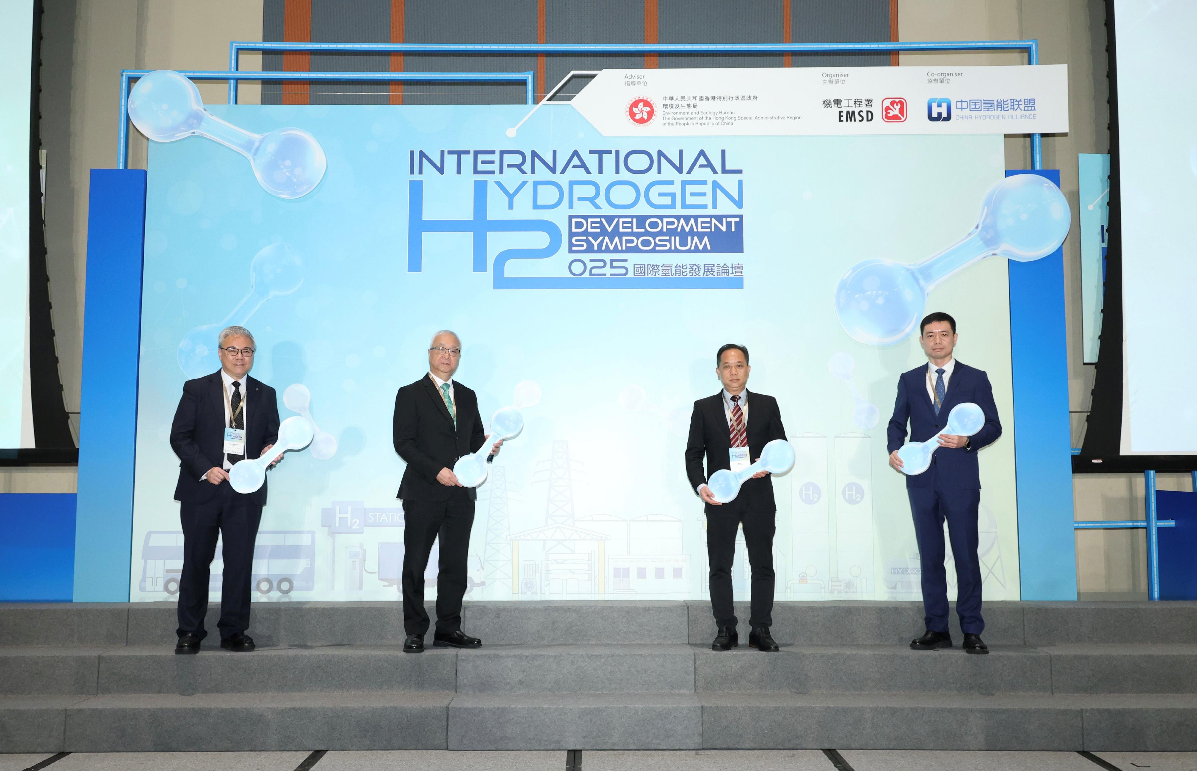 The opening ceremony of the International Hydrogen Development Symposium 2025, organised by the Electrical and Mechanical Services Department, and co-organised by the China Hydrogen Alliance, was held today (March 13) at the Hong Kong Science Park. Photo shows the Deputy Director-General of the Department of Educational, Scientific and Technological Affairs of the Liaison Office of the Central People's Government in the Hong Kong Special Administrative Region, Mr Ye Shuiqiu (second right); the Secretary for Environment and Ecology, Mr Tse Chin-wan (second left); the Director of Electrical and Mechanical Services, Mr Poon Kwok-ying (first left); and the Secretary General of the China Hydrogen Alliance, Mr Liu Wei (first right), officiating at the opening ceremony of the symposium.