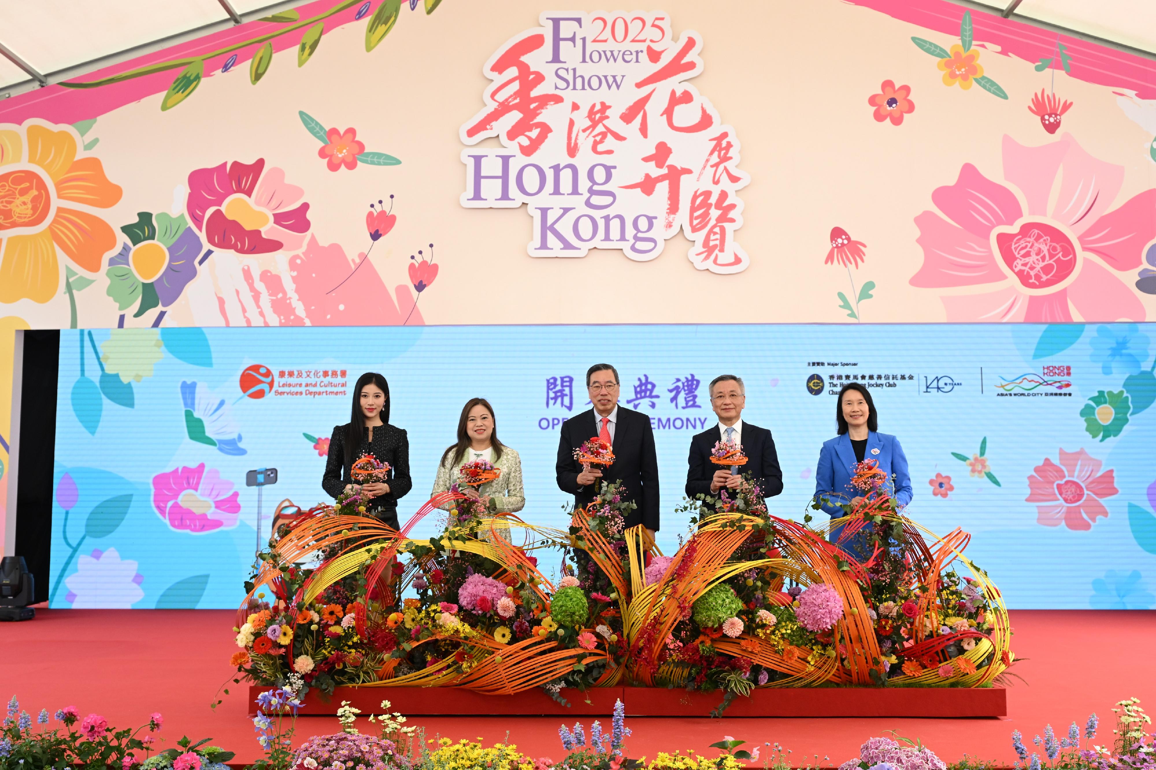 The annual Hong Kong Flower Show extravaganza opened at Victoria Park today (March 14) with some 400 000 flowers on display, including about 40 000 cosmos, this year's theme flower, and "Ablaze with Glory" as the main theme. Photo shows (from left) Miss Hong Kong 2024, Ellyn Ngai; the Secretary for Culture, Sports and Tourism, Miss Rosanna Law; the President of the Legislative Council, Mr Andrew Leung; Steward of the Hong Kong Jockey Club Mr Philip Lo; and the Director of Leisure and Cultural Services, Ms Manda Chan, at the opening ceremony.