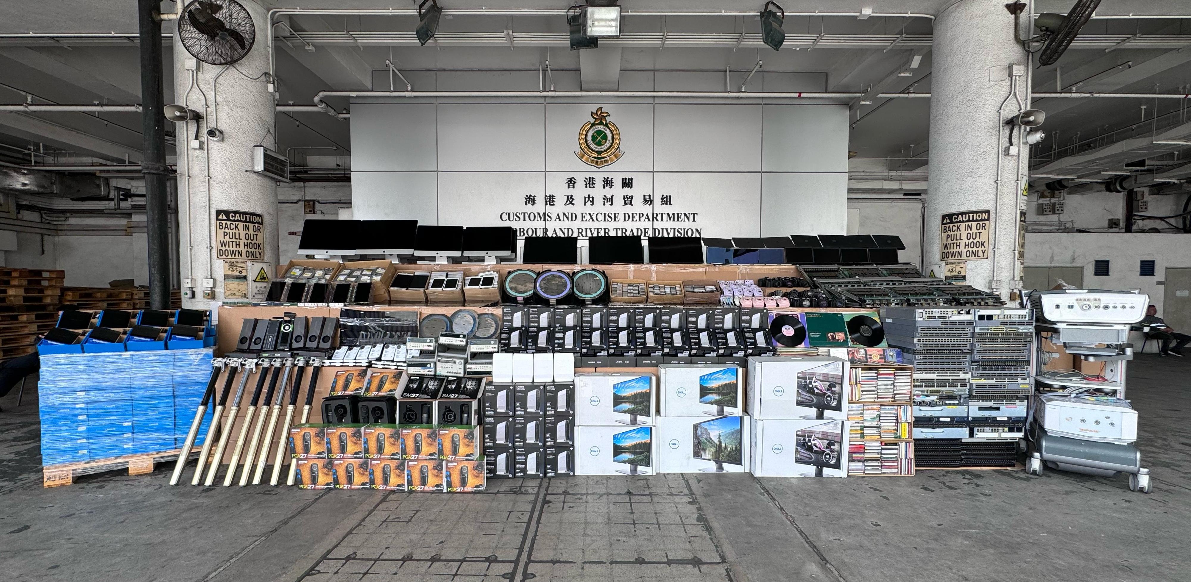Hong Kong Customs on March 1 and 3 detected four sea smuggling cases involving ocean-going vessels and a river trade vessel at the Kwai Chung Container Terminals and the Tsing Yi Customs Cargo Examination Compound. A large batch of suspected smuggled electronic goods with a total estimated market value of about $355 million was seized. Photo shows the suspected smuggled electronic goods seized.