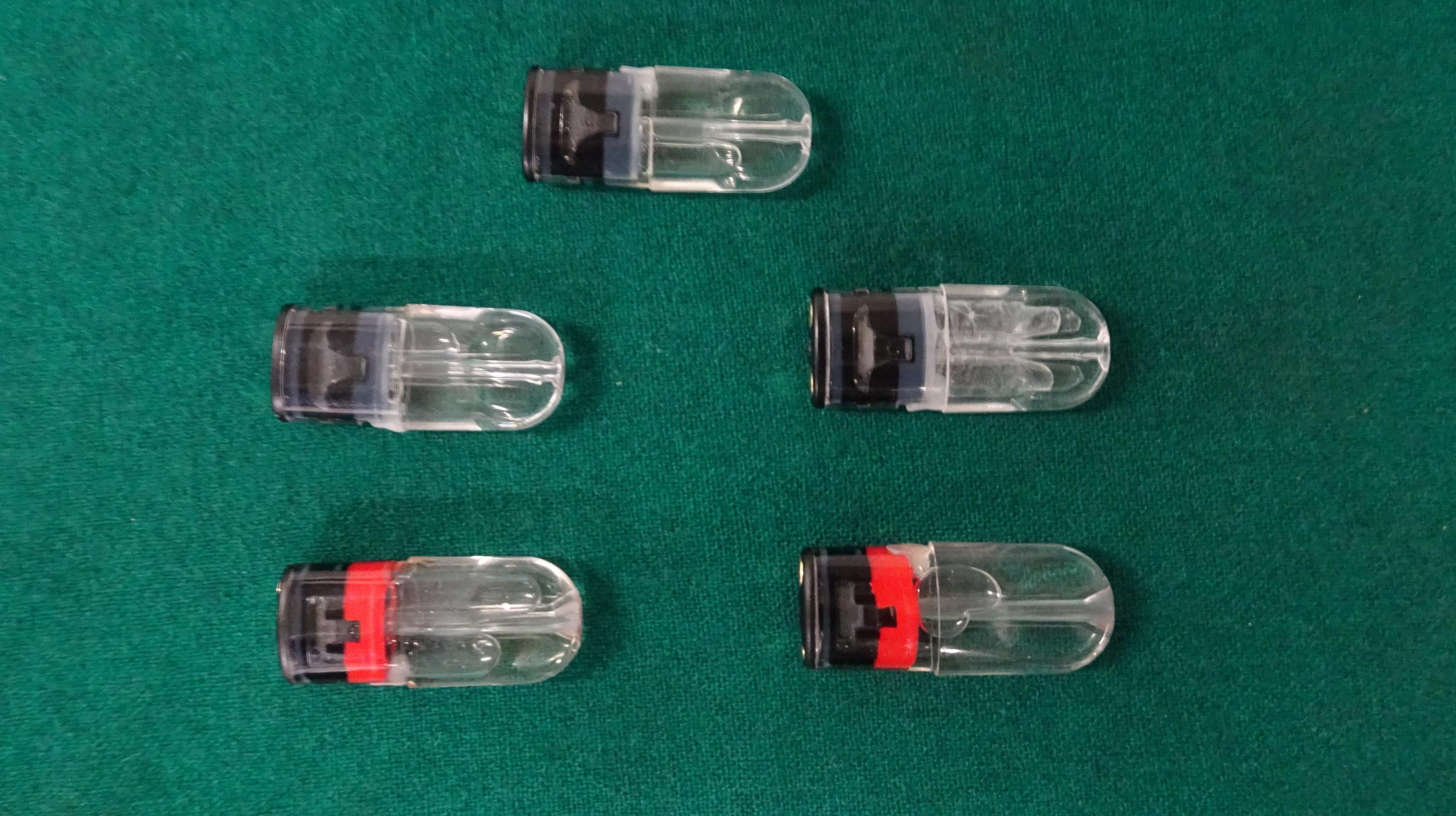 Hong Kong Customs detected a case involving possession of etomidate, the main ingredient of the "space oil drug", which is under the Dangerous Drug Ordinance, and possession of "Tadalafil", which is a Part 1 poison under the Pharmacy and Poisons Ordinance, by an outgoing passenger at the Lok Ma Chau Control Point on March 14. Five suspected "space oil drug" capsules, sixteen tablets of suspected "Tadalafil" and one vape stick were seized. Photo shows the suspected "space oil drug" capsules seized.