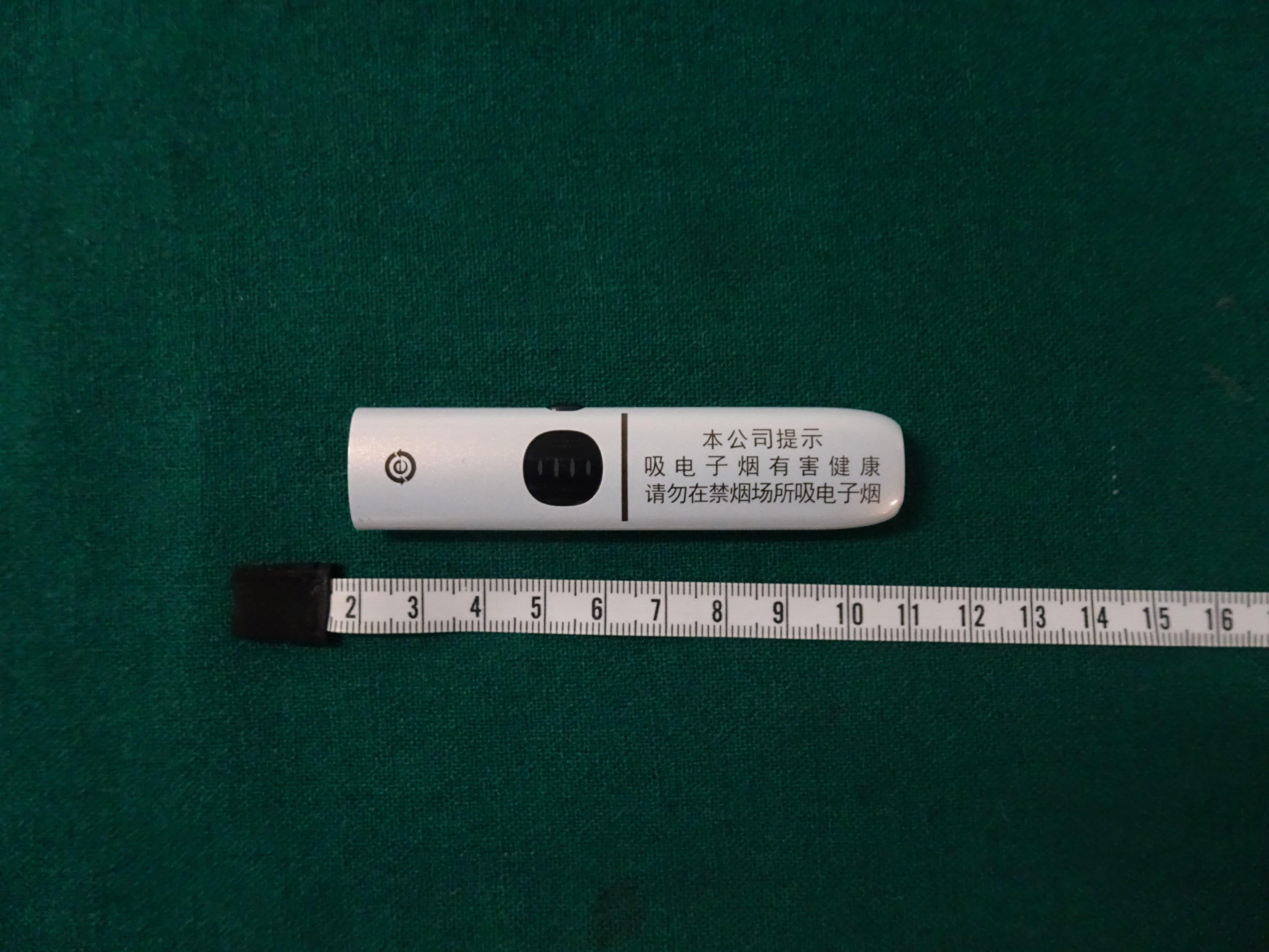 Hong Kong Customs detected a case involving possession of etomidate, the main ingredient of the "space oil drug", which is under the Dangerous Drug Ordinance, and possession of "Tadalafil", which is a Part 1 poison under the Pharmacy and Poisons Ordinance, by an outgoing passenger at the Lok Ma Chau Control Point on March 14. Five suspected "space oil drug" capsules, sixteen tablets of suspected "Tadalafil" and one vape stick were seized. Photo shows the vape stick seized.