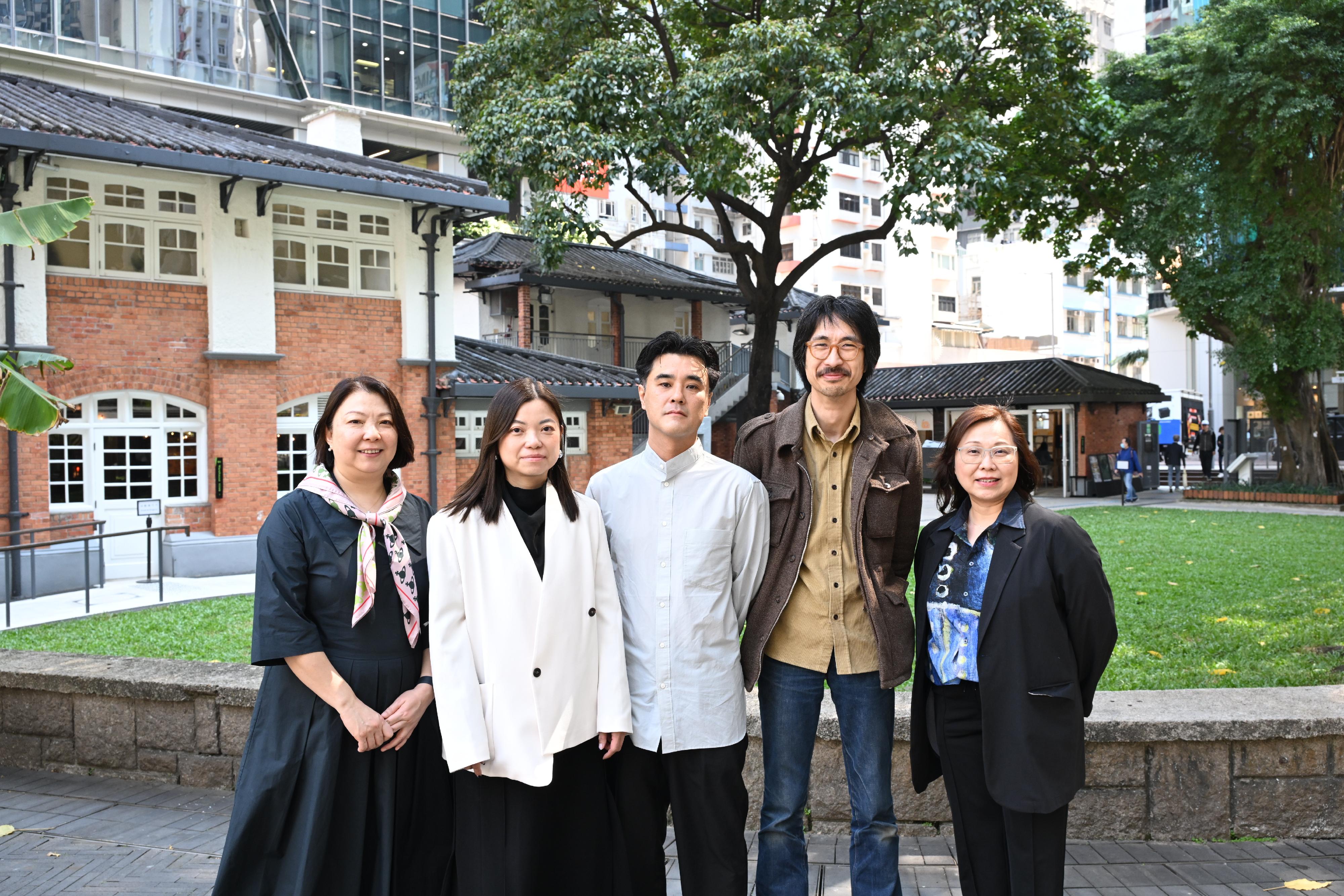 The Oil Street Art Space (Oi!) will launch three new "Oi! Spotlight" exhibitions from tomorrow (March 22). Photo shows the Head of the Art Promotion Office, Apo Wu (first left); the Curator of Oi!, Joan Chung (first right); artists Toyofuku Ryo (centre); Phoebe Hui (second left); and Adrian Wong (second right).