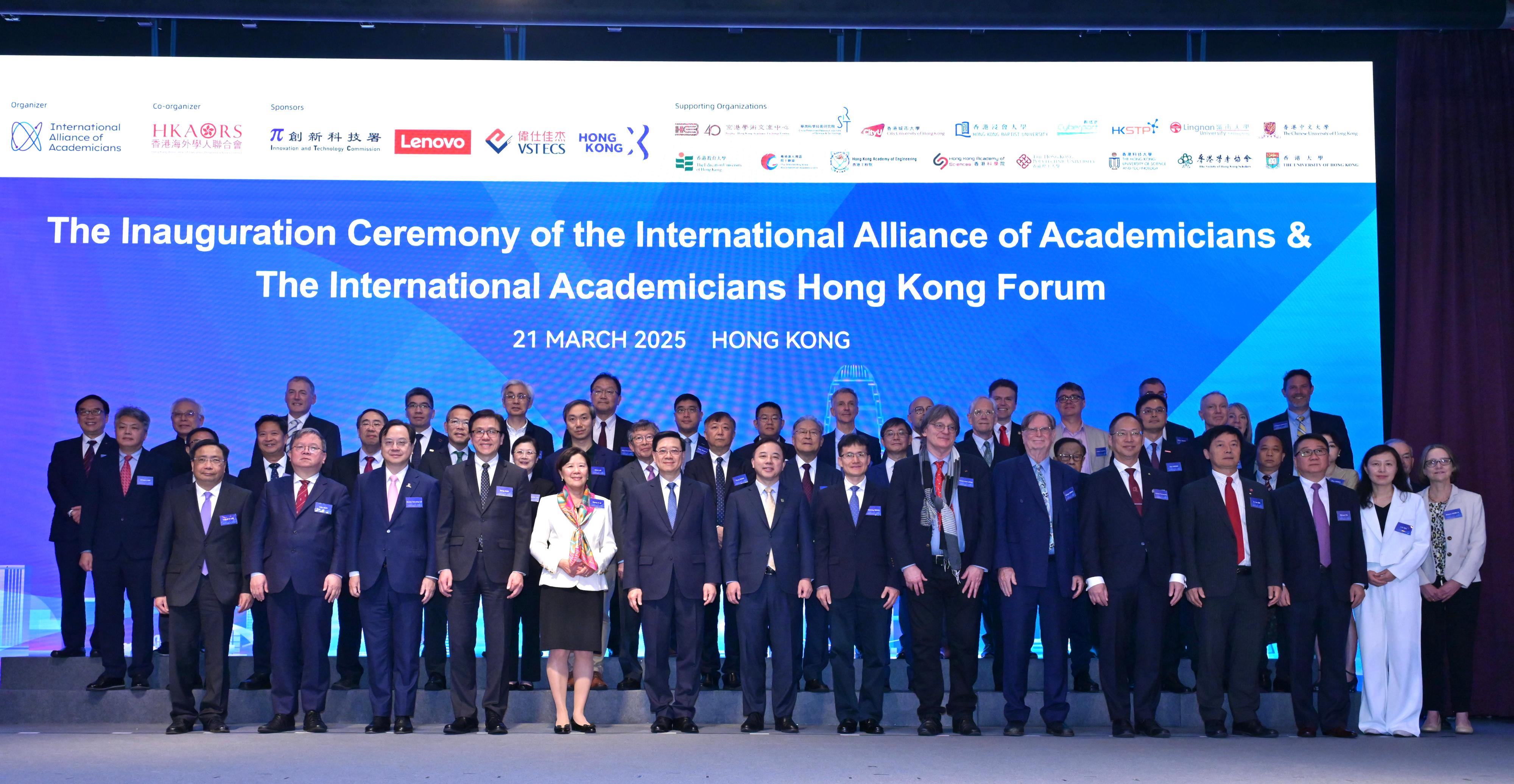 The Chief Executive, Mr John Lee, attended the Inauguration Ceremony of the International Alliance of Academicians (IAA) and the International Academicians Hong Kong Forum today (March 21). Photo shows (front row, from fourth left) the Secretary for Innovation, Technology and Industry, Professor Sun Dong; the Chair of the IAA, Professor Nancy Ip; Mr Lee; Co-Chair of the IAA Professor Zhang Xiang; the Director-General of the Department of Educational, Scientific and Technological Affairs of the Liaison Office of the Central People's Government in the Hong Kong Special Administrative Region, Dr Wang Weiming; Co-Chair of the IAA Professor Pierre-Louis Lions; Co-Chair of the IAA Professor George Smoot, and other guests at the event.