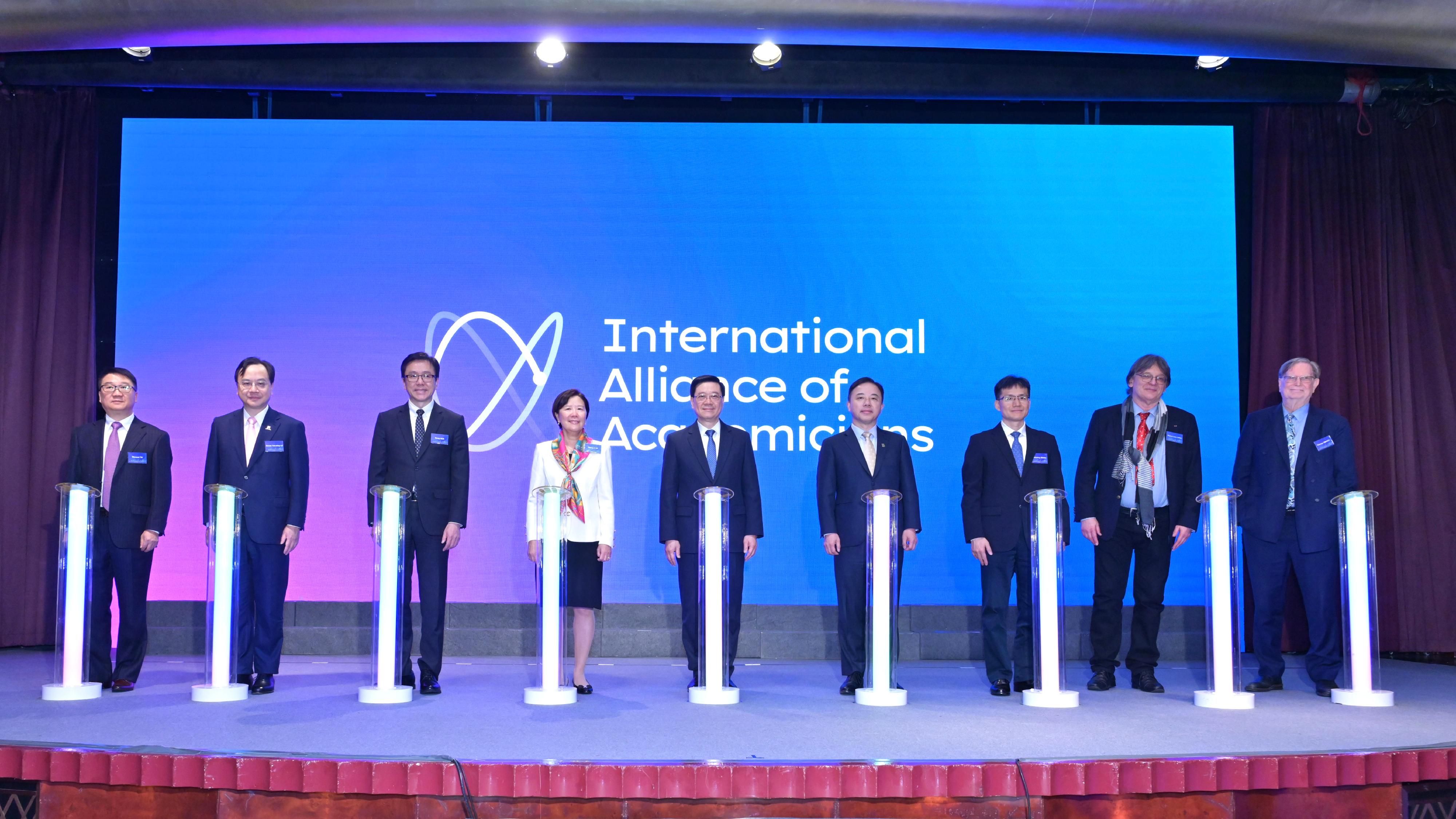 The Chief Executive, Mr John Lee, attended the Inauguration Ceremony of the International Alliance of Academicians (IAA) and the International Academicians Hong Kong Forum today (March 21). Photo shows (from third left) the Secretary for Innovation, Technology and Industry, Professor Sun Dong; the Chair of the IAA, Professor Nancy Ip; Mr Lee; Co-Chair of the IAA Professor Zhang Xiang; the Director-General of the Department of Educational, Scientific and Technological Affairs of the Liaison Office of the Central People's Government in the Hong Kong Special Administrative Region, Dr Wang Weiming; Co-Chair of the IAA Professor Pierre-Louis Lions; Co-Chair of the IAA Professor George Smoot, and other guests officiating at the event.