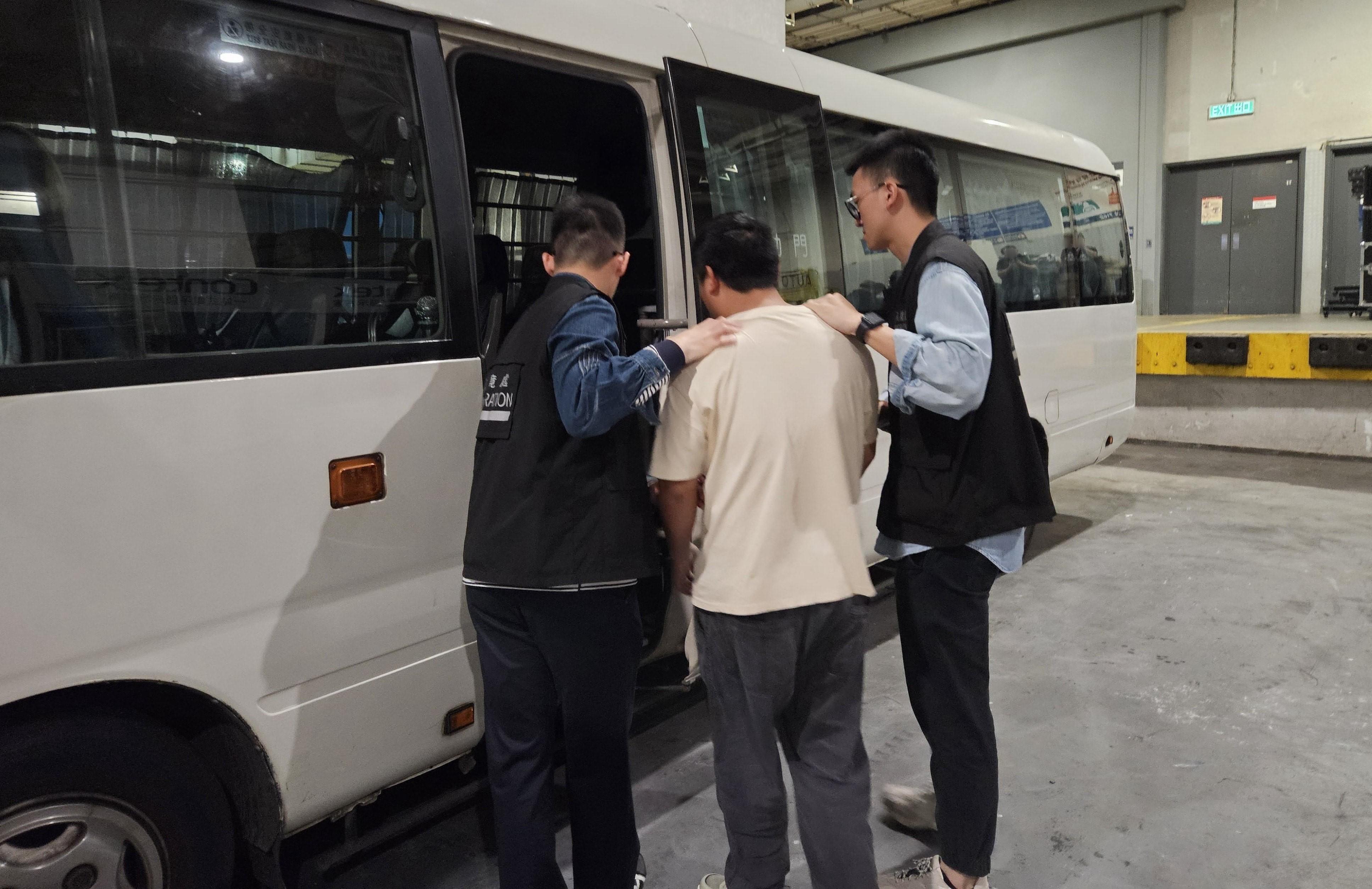 The Immigration Department mounted a series of territory-wide anti-illegal worker operations codenamed "Greenlane", "Lightshadow" and "Twilight", and joint operation with the Hong Kong Police Force codenamed "Champion", for four consecutive days from March 17 to yesterday (March 20). Photo shows a suspected illegal worker arrested during an operation.