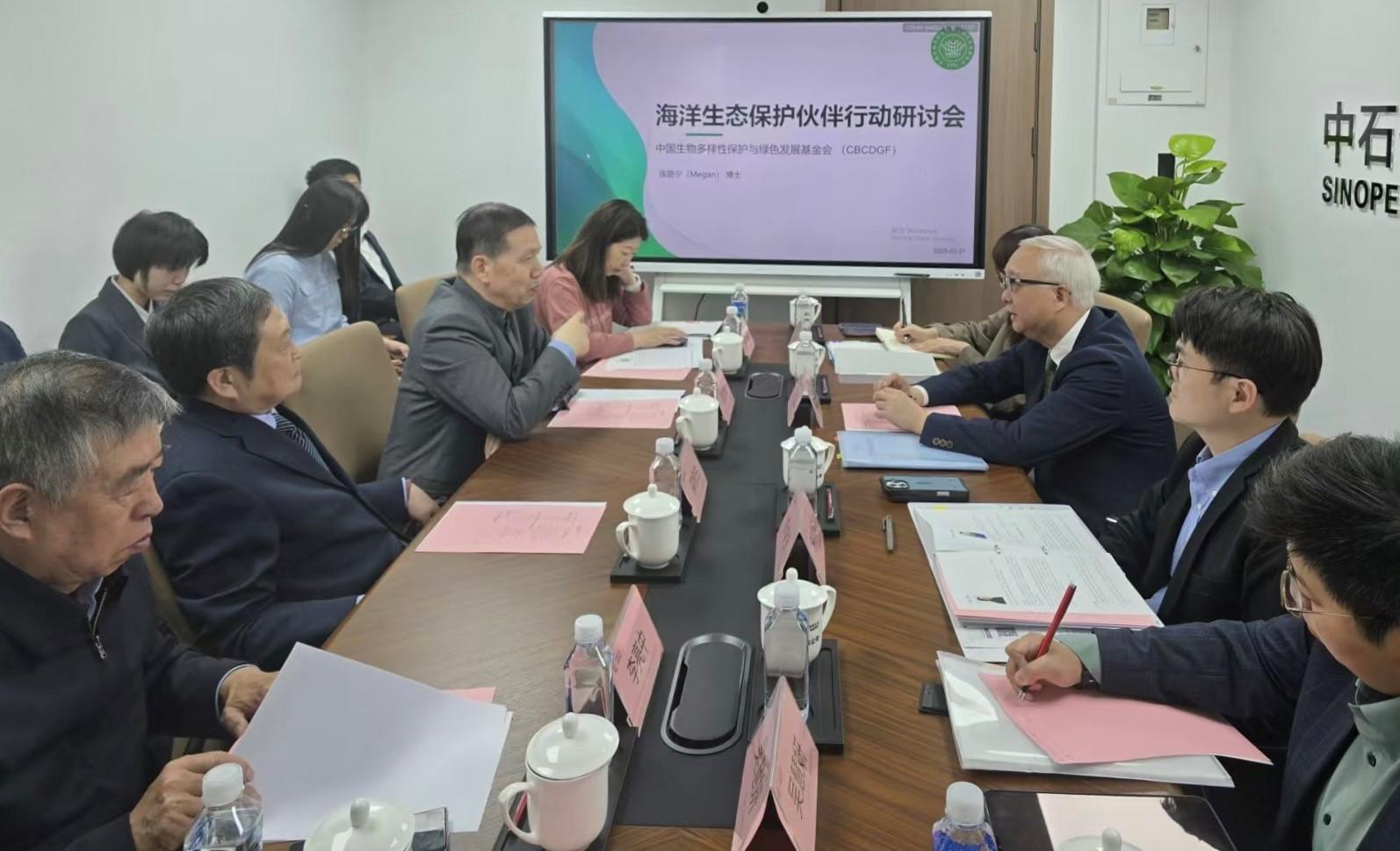 The Secretary for Environment and Ecology, Mr Tse Chin-wan, concluded his visit to Beijing today (March 21). Photo shows Mr Tse (third right); and the Commissioner for Climate Change, Mr Arthur Lee (second right), meeting with representatives from the China Biodiversity Conservation and Green Development Foundation.