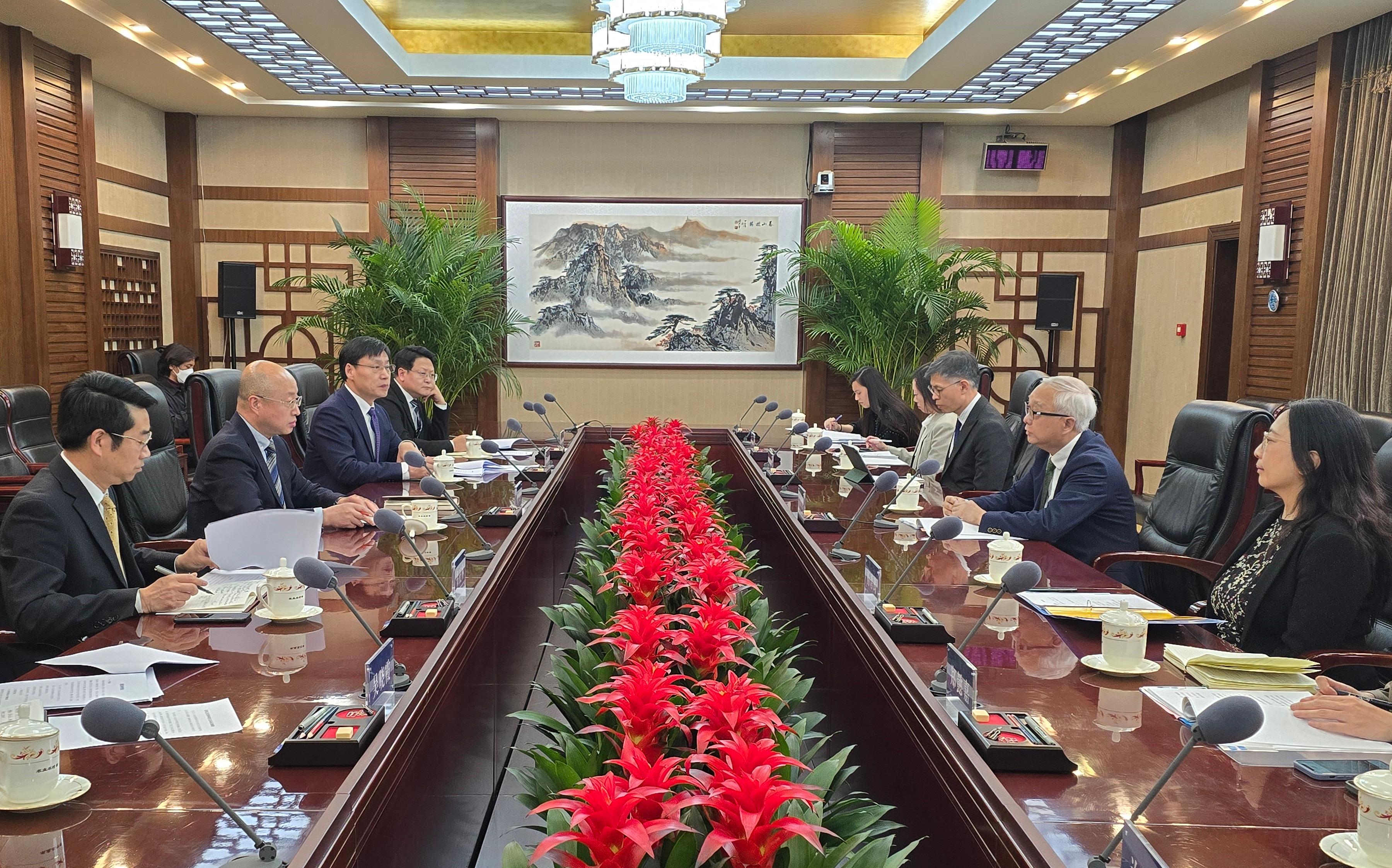 The Secretary for Environment and Ecology, Mr Tse Chin-wan, concluded his visit to Beijing today (March 21). Photo shows Mr Tse (second right); the Permanent Secretary for Environment and Ecology (Food), Ms Irene Young (first right); and the Director of Agriculture, Fisheries and Conservation, Mr Mickey Lai (third right), meeting with the Vice Minister of Agriculture and Rural Affairs, Mr Zhang Xingwang (second left).