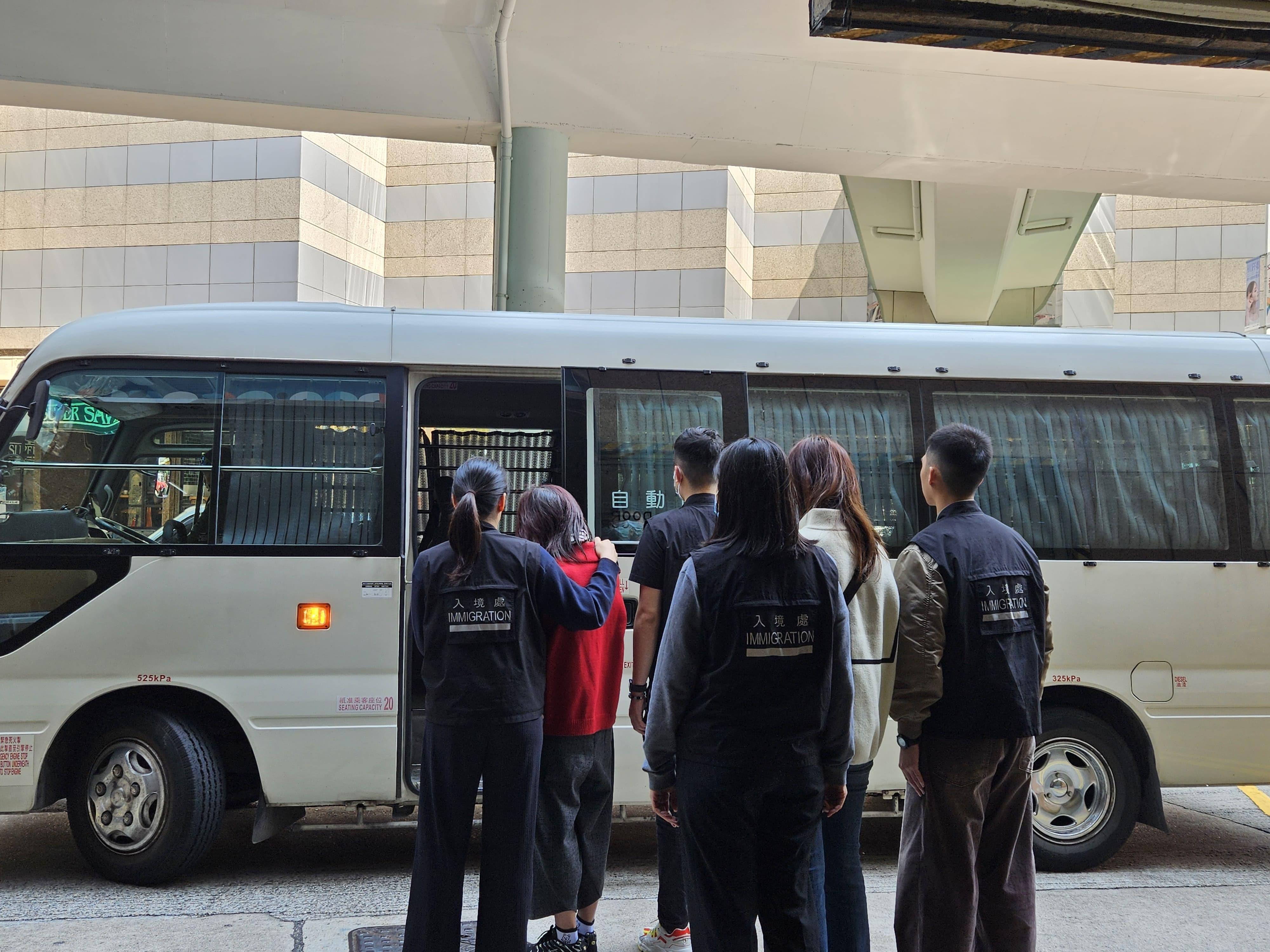 The Immigration Department mounted an anti-illegal worker operation to combat illegal workers providing agent services for submitting applications for vehicle licences in Hong Kong on March 19. Photo shows the persons arrested during an operation.