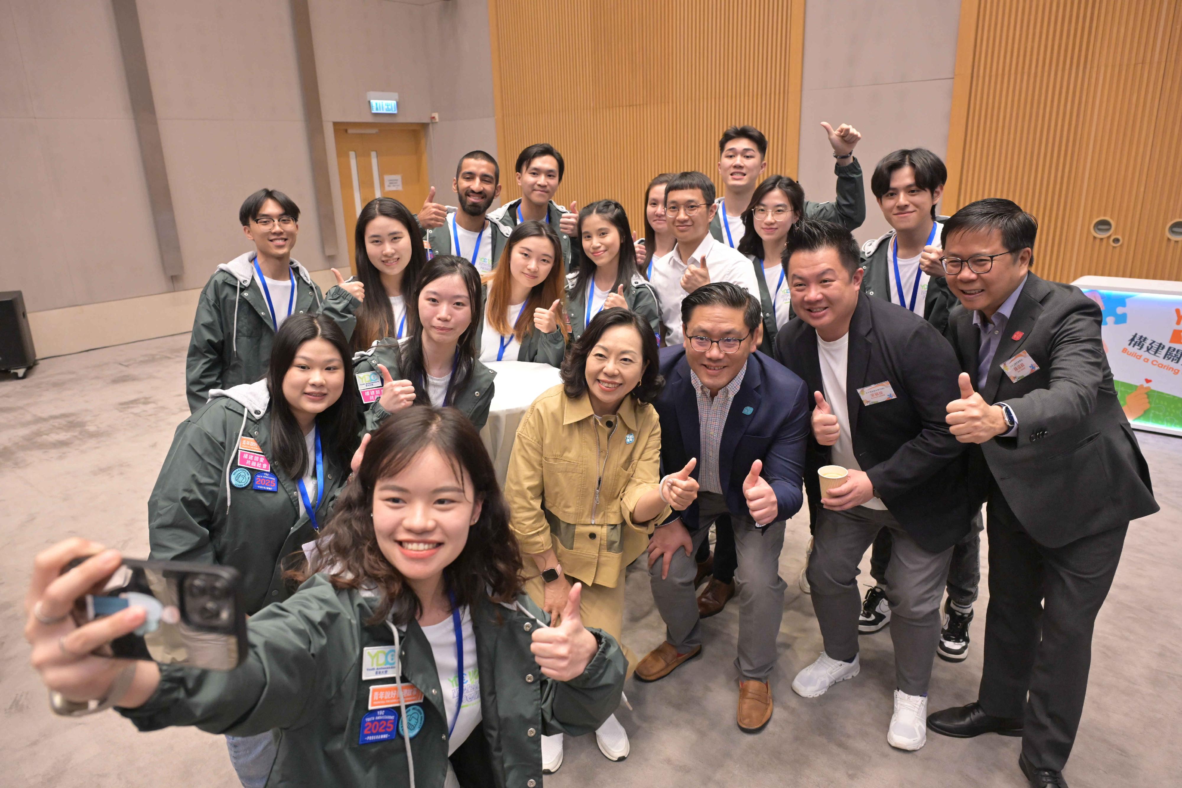 The Secretary for Home and Youth Affairs, Miss Alice Mak, officiated at the kick-off ceremony of the YDC Youth Ambassadors Programme 2025 today (March 22). Photo shows Miss Mak (front row, fourth right); the Under Secretary for Home and Youth Affairs, Mr Clarence Leung (front row, third right); the Vice-Chairman of the Youth Development Commission, Mr Kenneth Leung (front row, second right); and the Commissioner for Youth, Mr Eric Chan (front row, first right), pictured with a representative of the YDC Youth Ambassadors 2024 and the YDC Youth Ambassadors Cadets.