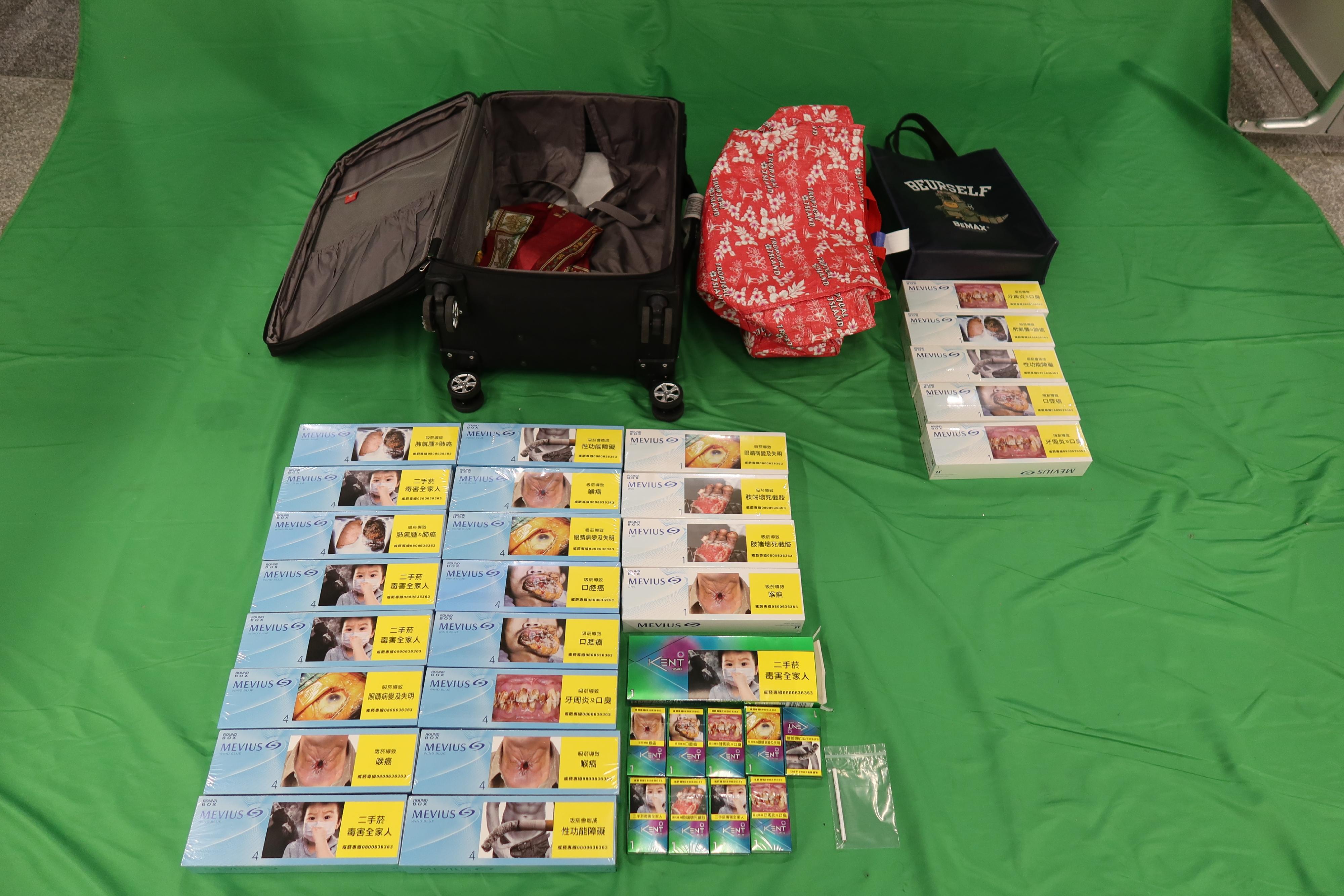 An incoming 44-year-old male passenger was sentenced to 38 days' imprisonment and fined of $1,000 at the Kowloon City Magistrates' Courts today (March 22) for possessing duty-not-paid cigarettes and failing to declare to Customs Officers, in contravention of the Dutiable Commodities Ordinance. Photo shows the duty-not-paid cigarettes seized.
