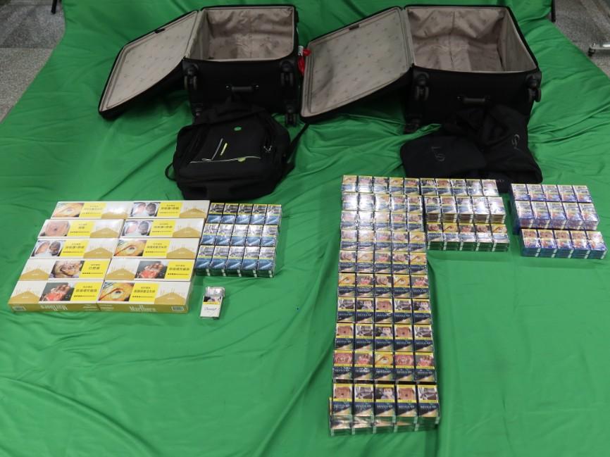 An incoming 54-year-old female passenger was sentenced to 48 days' imprisonment and fined of $1,200 at the Kowloon City Magistrates' Courts today (March 22) for possessing duty-not-paid cigarettes and failing to declare to Customs Officers, in contravention of the Dutiable Commodities Ordinance. Photo shows the duty-not-paid cigarettes seized.
