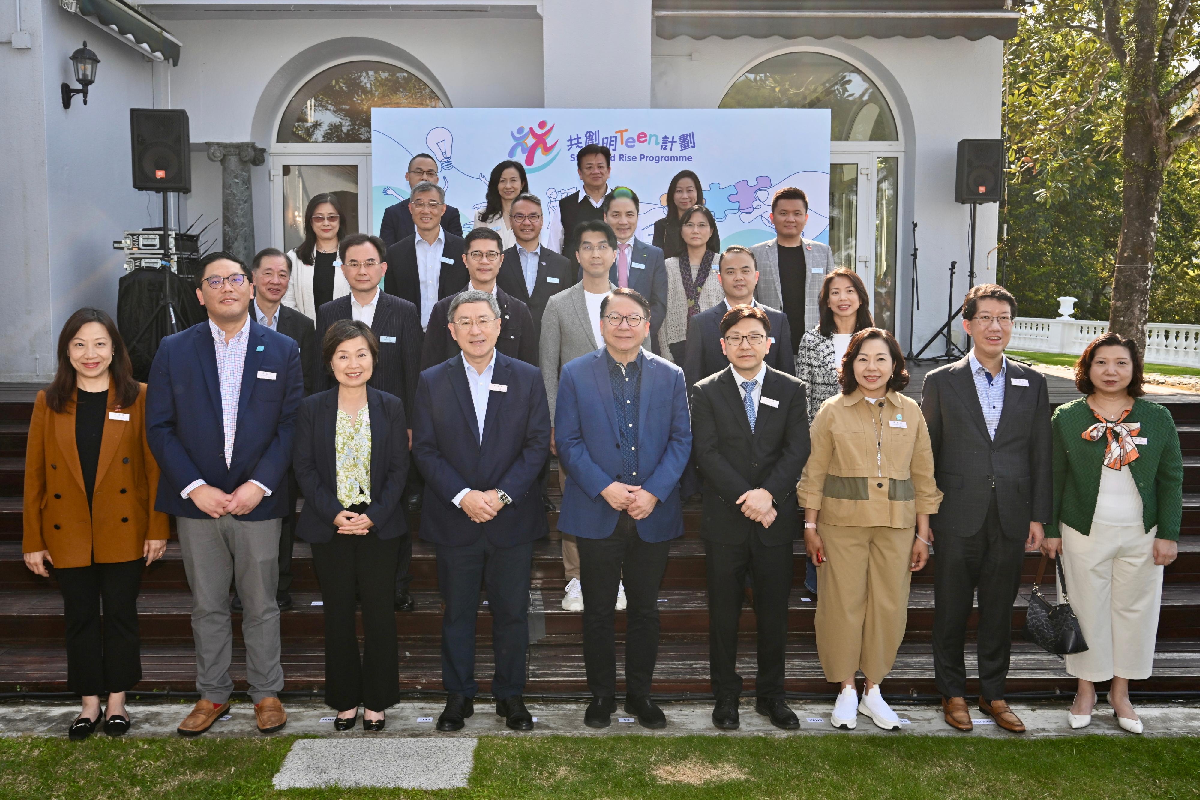 The Chief Secretary for Administration, Mr Chan Kwok-ki, held a gathering today (March 22) with the third-term Partners' Board under the Strive and Rise Programme and some 200 guests who have been actively involved in the Programme, sharing the Programme's fruitful achievements since its implementation. Photo shows Mr Chan (front row, centre); the Deputy Chief Secretary for Administration, Mr Cheuk Wing-hing (front row, fourth left); the Secretary for Labour and Welfare, Mr Chris Sun (front row, fourth right); the Secretary for Education, Dr Choi Yuk-lin (front row, third left); the Secretary for Home and Youth Affairs, Miss Alice Mak (front row, third right); the Under Secretary for Home and Youth Affairs, Mr Clarence Leung (front row, second left); the Director of Social Welfare, Mr Edward To (front row, second right); the Director of Home Affairs, Ms Priscilla To (front row, first left); and the Deputy Director of Social Welfare (Services), Ms Maggie Leung (front row, first right), together with strategic partners of the third-term Partners' Board of the Programme.