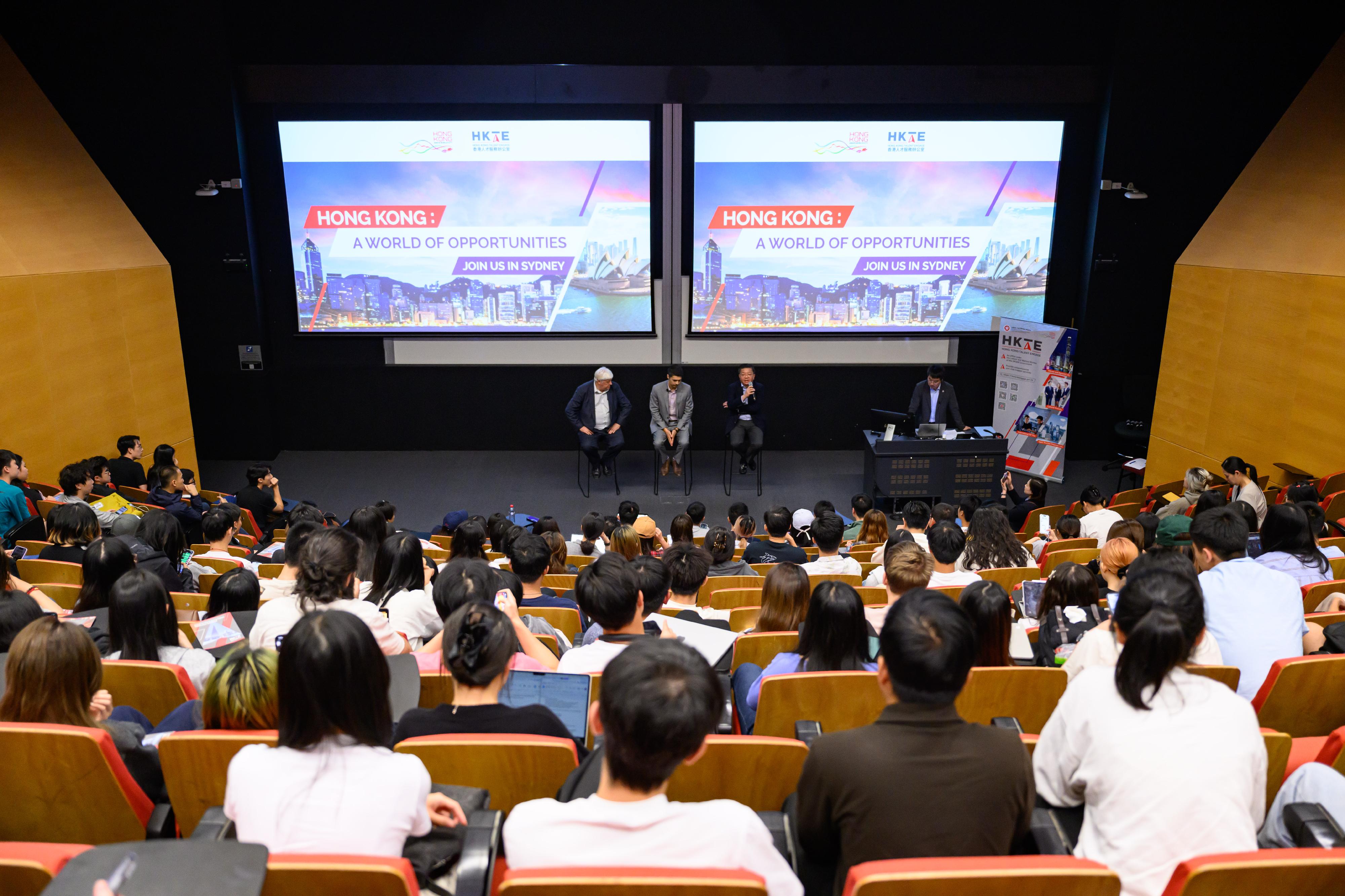 The Director of Hong Kong Talent Engage, Mr Anthony Lau, introduced Hong Kong's development opportunities to local talent at a talent engagement event held at the University of Sydney, Australia, on March 19 (Sydney time), featuring two Australian professionals who have been residing in Hong Kong. Photo shows Mr Lau (first right on stage) exchanging views with participants during the event.