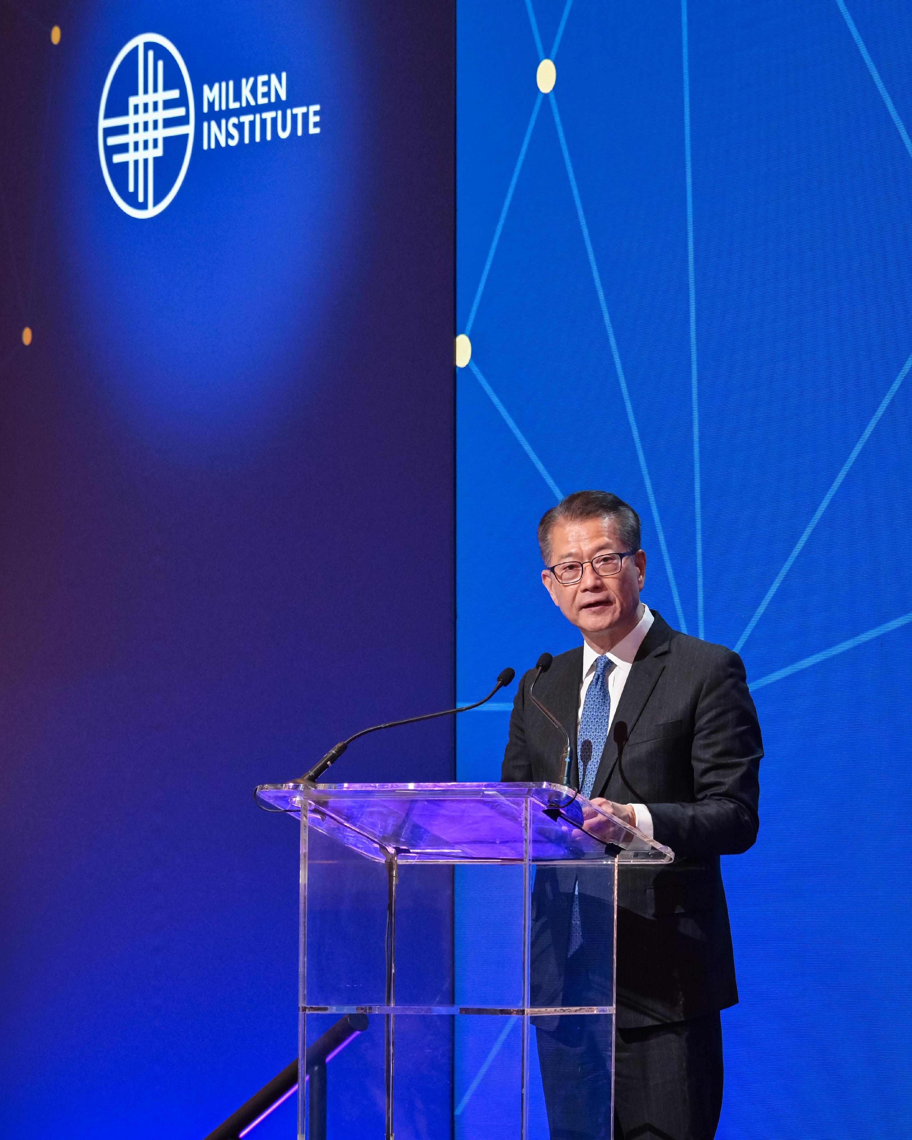 The Financial Secretary, Mr Paul Chan, speaks at the Milken Institute Global Investors' Symposium Hong Kong today (March 24).