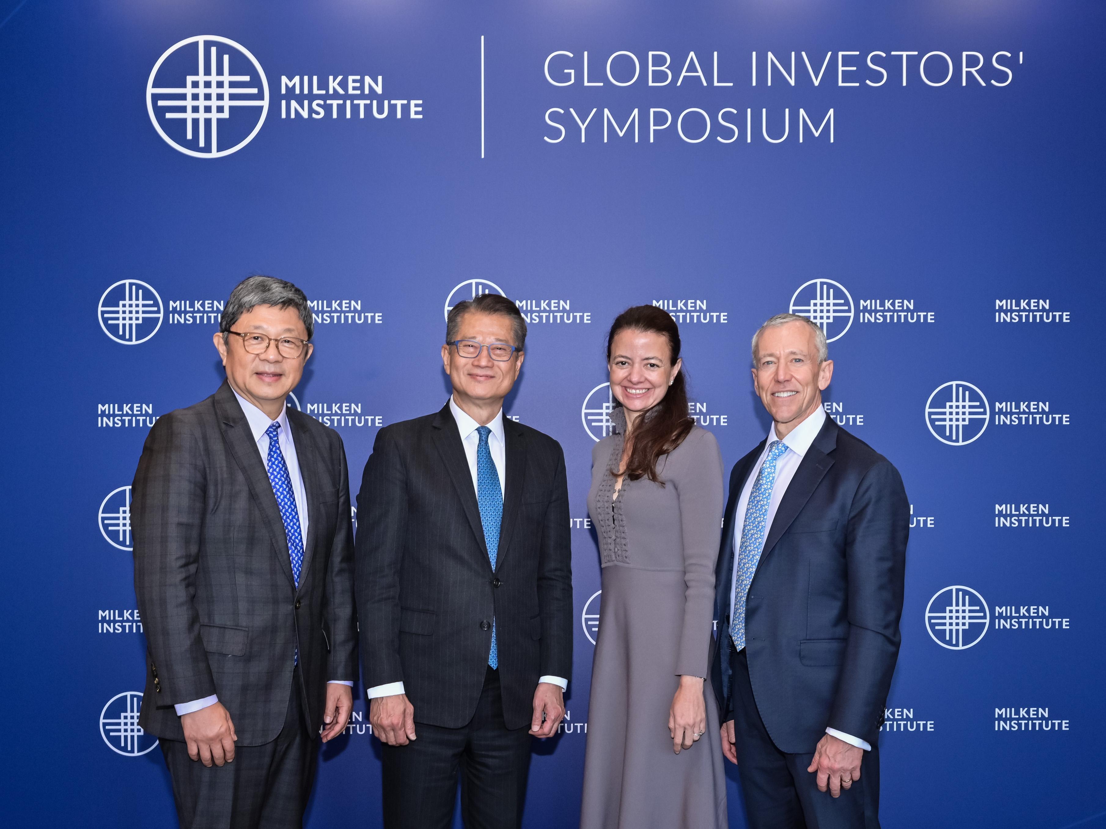The Financial Secretary, Mr Paul Chan, attended the Milken Institute Global Investors' Symposium Hong Kong today (March 24). Photo shows Mr Chan (second left); the Executive Vice President of the Milken Institute International, Ms Laura Deal Lacey (second right); and the Chair of Asia of the Milken Institute, Mr Robin Hu (first left), at the symposium.
