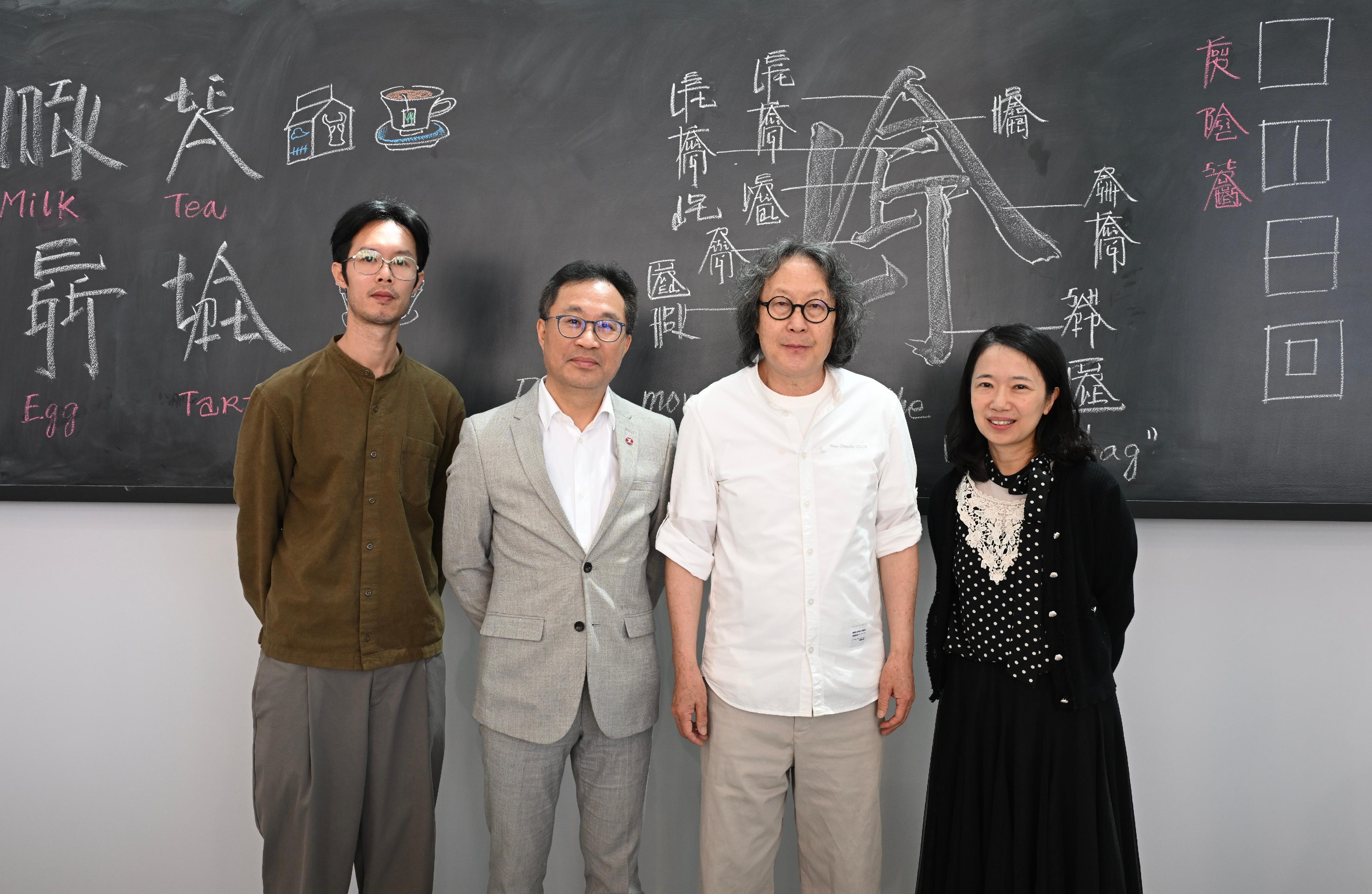 Following world-renowned artist Xu Bing's appointment as Hong Kong's Ambassador for Cultural Promotion, "Xu Bing in Hong Kong: Square Word Calligraphy" marks the renowned artist's inaugural commissioning art initiative in the city. The initiatives feature exhibitions at the Hong Kong Museum of Art and later at the Oil Street Art Space, new works displayed in four MTR stations and school workshops. Photo shows Xu (second right); the Head of the Projects and Development Section of the Leisure and Cultural Services Department, Ms Lo Yan-yan (first right); Senior Project Architectural Manager of MTR Corporation Limited Mr Cheng Kwok-wai (second left); and education partner, Project Manager of Community Art Network, Mr Roland Ip (first left).