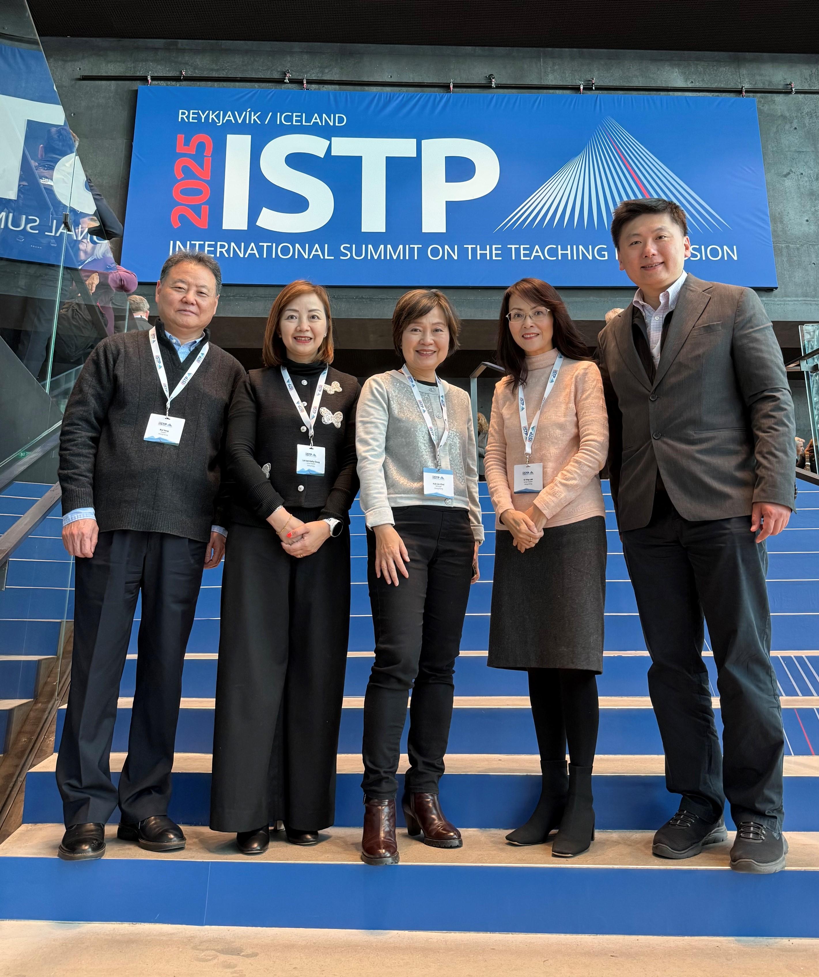 The Secretary for Education, Dr Choi Yuk-lin (centre), is pictured with the delegation of Hong Kong principals and education experts attending the International Summit on the Teaching Profession 2025 in Reykjavík, Iceland, on March 24 (Reykjavík time). Members of the delegation include the Dean of the Faculty of Education of the University of Hong Kong, Professor Yang Rui (first left); the Chairperson of the Hong Kong Aided Primary School Heads Association, Ms Chung Lai-kam (second left); Associate Provost (Digital Learning) of City University of Hong Kong and Vice-Chairman of Hong Kong Federation of Education Workers, Professor Cheung Chak-chung (first right); and the Chairman of the Hong Kong Subsidized Secondary Schools Council, Ms Lee Yi-ying (second right).