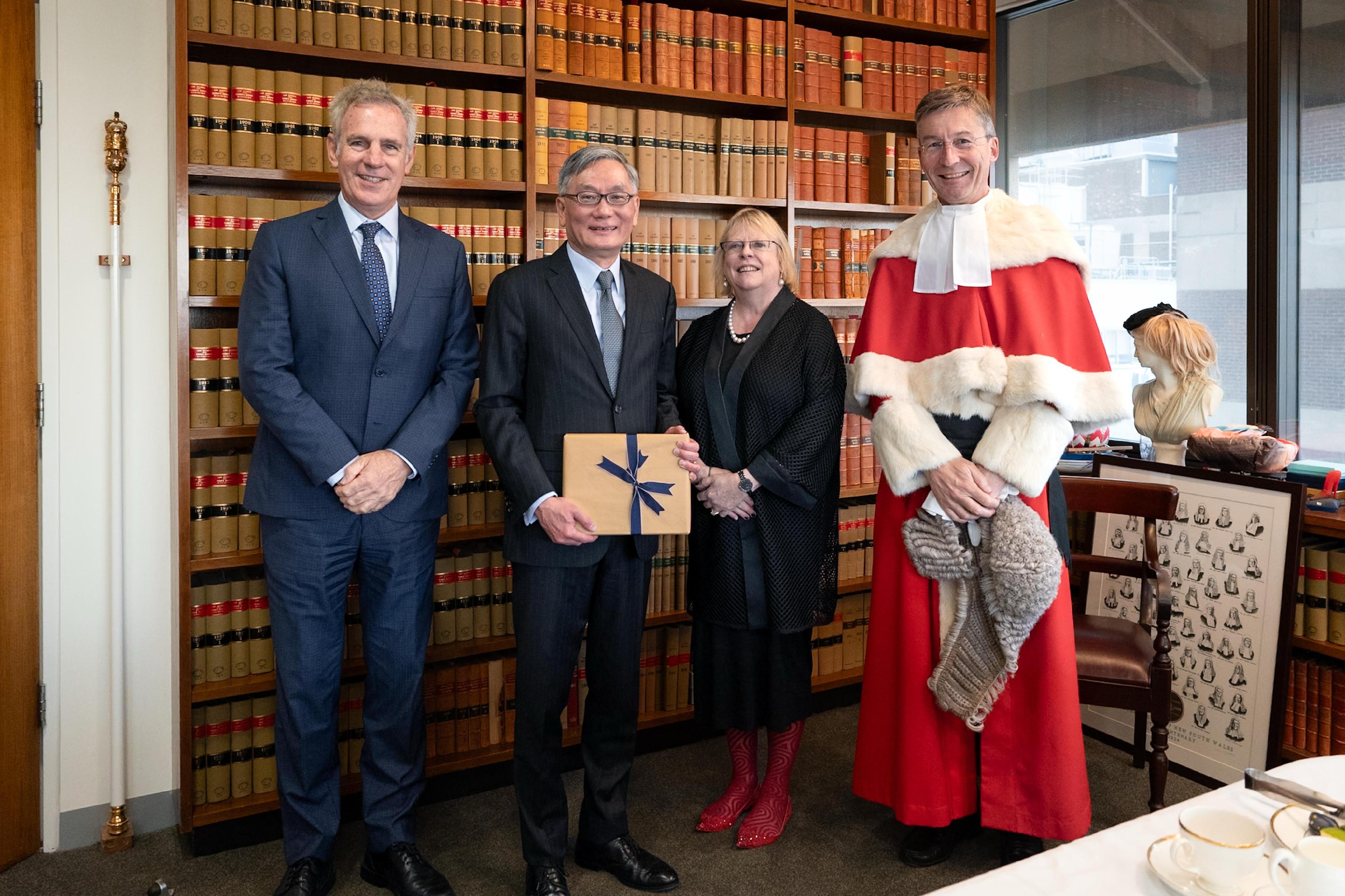 Chief Justice Andrew Cheung, Chief Justice of the Court of Final Appeal, led a high-level delegation this Monday (March 24) to attend the 2025 Asia-Pacific Judicial Colloquium in Canberra, Australia. Photo shows Chief Justice Cheung (second left) meeting with the Acting Chief Justice and the President of the Court of Appeal of the Supreme Court of New South Wales, the Hon Justice Julie Ward (second right), during his visit to the court in Sydney earlier.