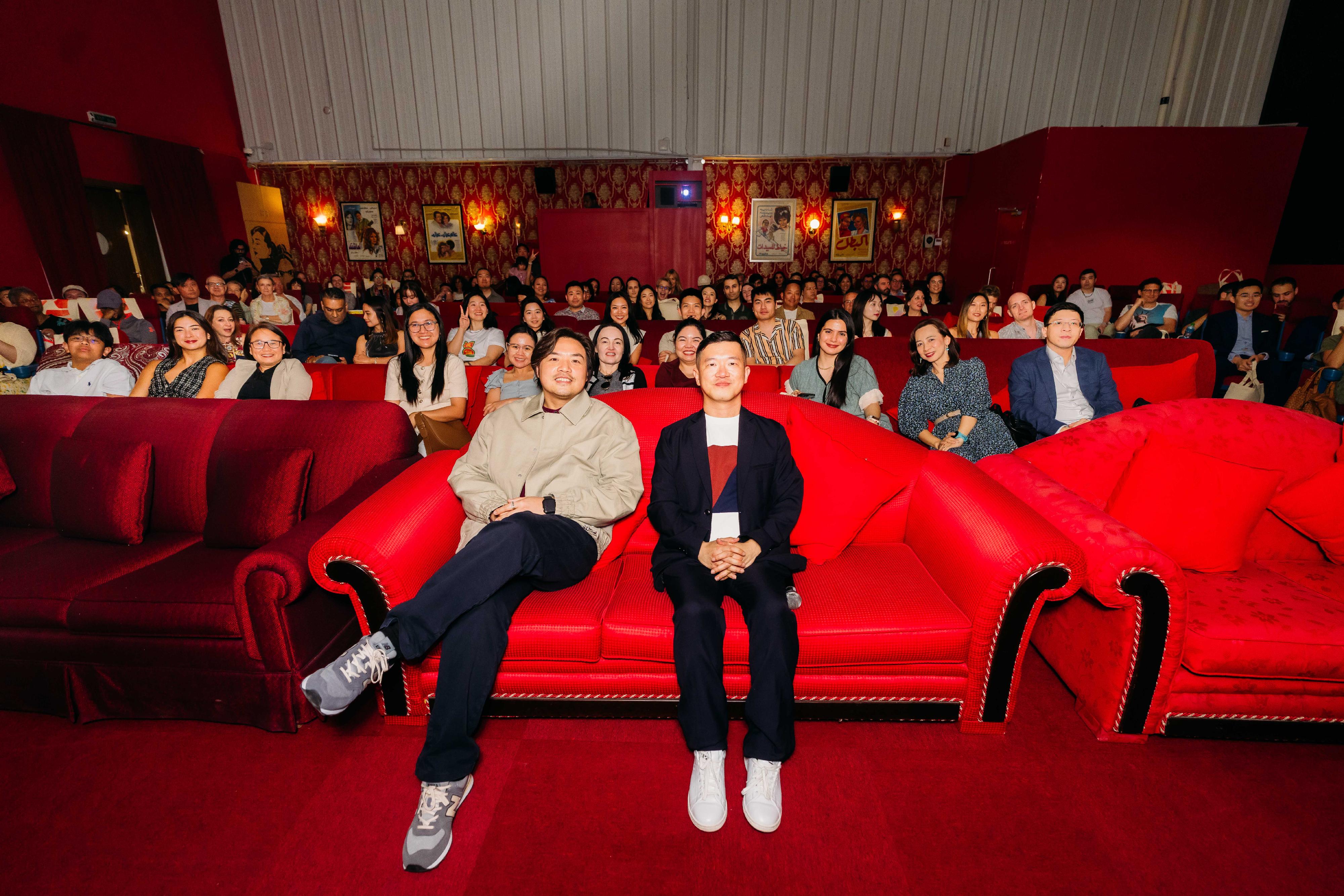 The Hong Kong Film Gala Presentation returned to Dubai, the United Arab Emirates, from March 22 to 28 to showcase a selection of eight new and classic Hong Kong films to local audiences. Photo shows film enthusiasts and members of the sector taking a group photo with director Thomas Lee (front row, left) and film critic Patrick Suen (front row, right) before the screening of the opening film "An Abandoned Team".
