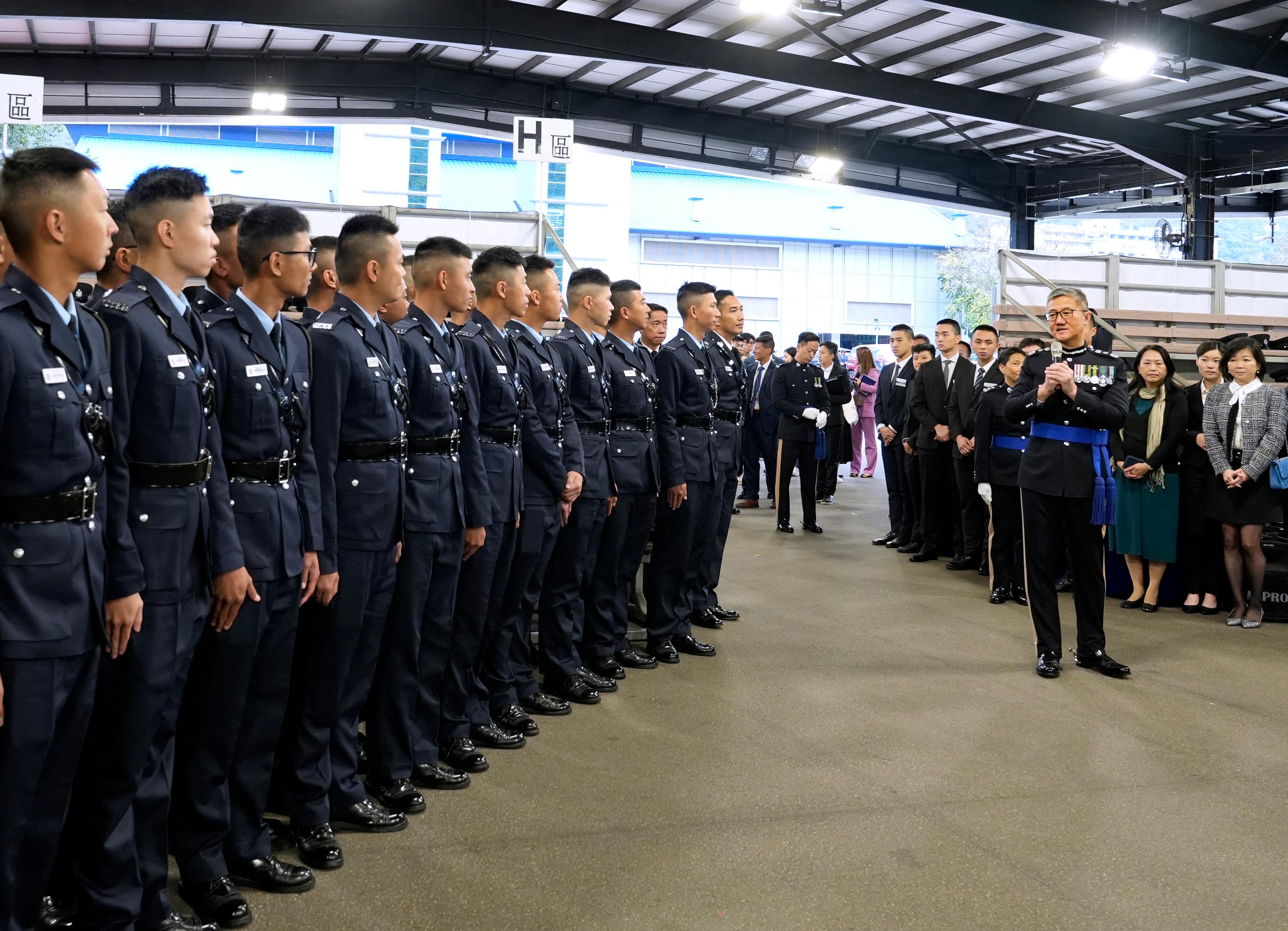 The Commissioner of Police, Mr Siu Chak-yee (front row, first right), meets graduates after the passing-out parade held at the Hong Kong Police College today (March 29).