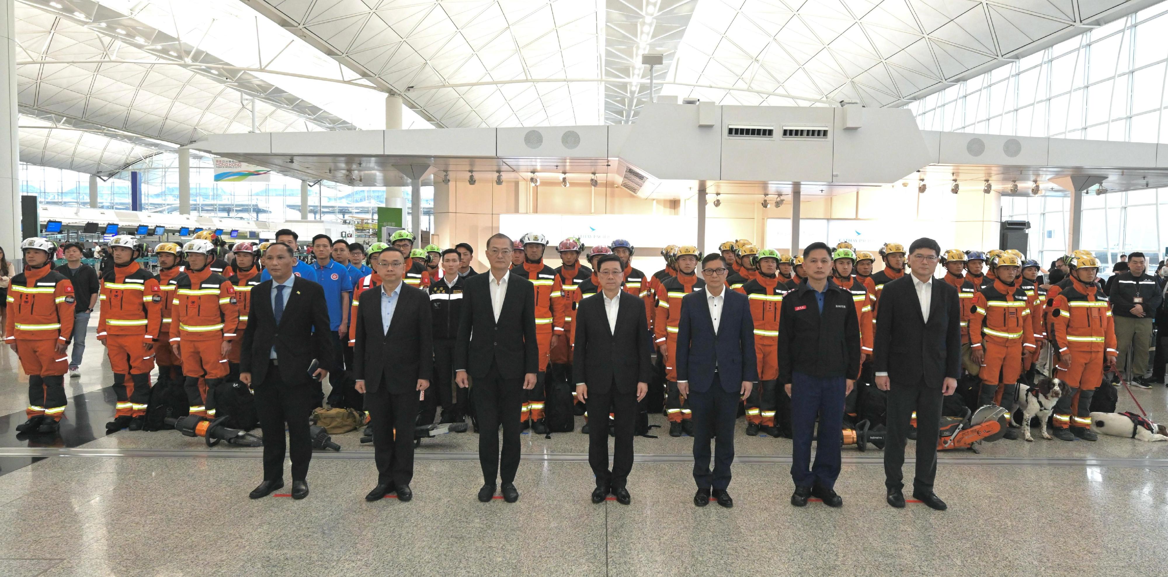 The Hong Kong Special Administrative Region (HKSAR) Government today (March 29) sent a search and rescue team comprising officers from the Security Bureau, the Fire Services Department, the Immigration Department and the Hospital Authority to Myanmar to assist in the search and rescue work at the earthquake-stricken areas. Photo shows (first row, from left) the Consul-General of Myanmar in Hong Kong, Mr Han Win Naing; the Director of Immigration, Mr Benson Kwok; the Secretary for Health, Professor Lo Chung-mau; the Chief Executive, Mr John Lee; the Secretary for Security, Mr Tang Ping-keung; the Director of Fire Services, Mr Andy Yeung; the Chief Executive of the Hospital Authority, Dr Tony Ko, and the HKSAR search and rescue team.
