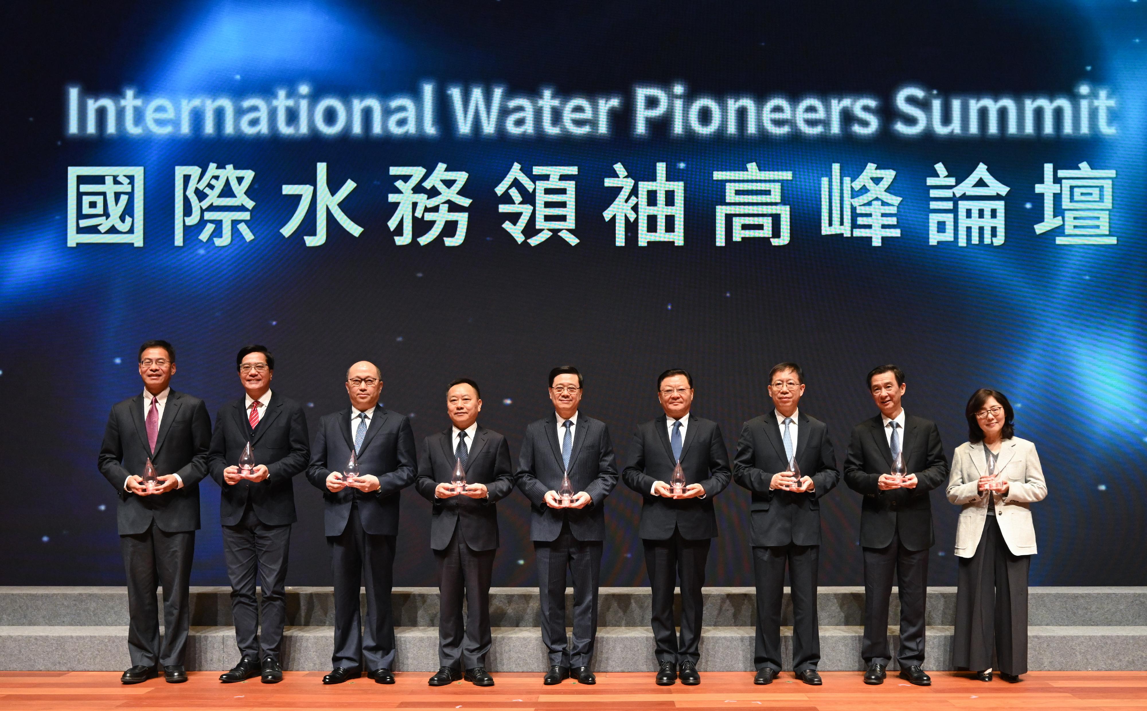 The Chief Executive, Mr John Lee, attended the opening ceremony of the International Water Pioneers Summit today (April 1). Photo shows (from left) Deputy Director of the Liaison Office of the Central People's Government (LOCPG) in the Hong Kong Special Administrative Region (HKSAR) Mr Qi Bin; the Deputy Financial Secretary, Mr Michael Wong; the Director of the LOCPG in the HKSAR, Mr Zheng Yanxiong; the Minister of the Ministry of Water Resources, Mr Li Guoying; Mr Lee; the Governor of Guangdong Province, Mr Wang Weizhong; Member of the Office Leadership of the Hong Kong and Macao Work Office of the Communist Party of China Central Committee Mr Xiang Bin; Vice-Governor of Guangdong Province Mr Zhang Shaokang; and the Secretary for Development, Ms Bernadette Linn, officiating at the opening ceremony.