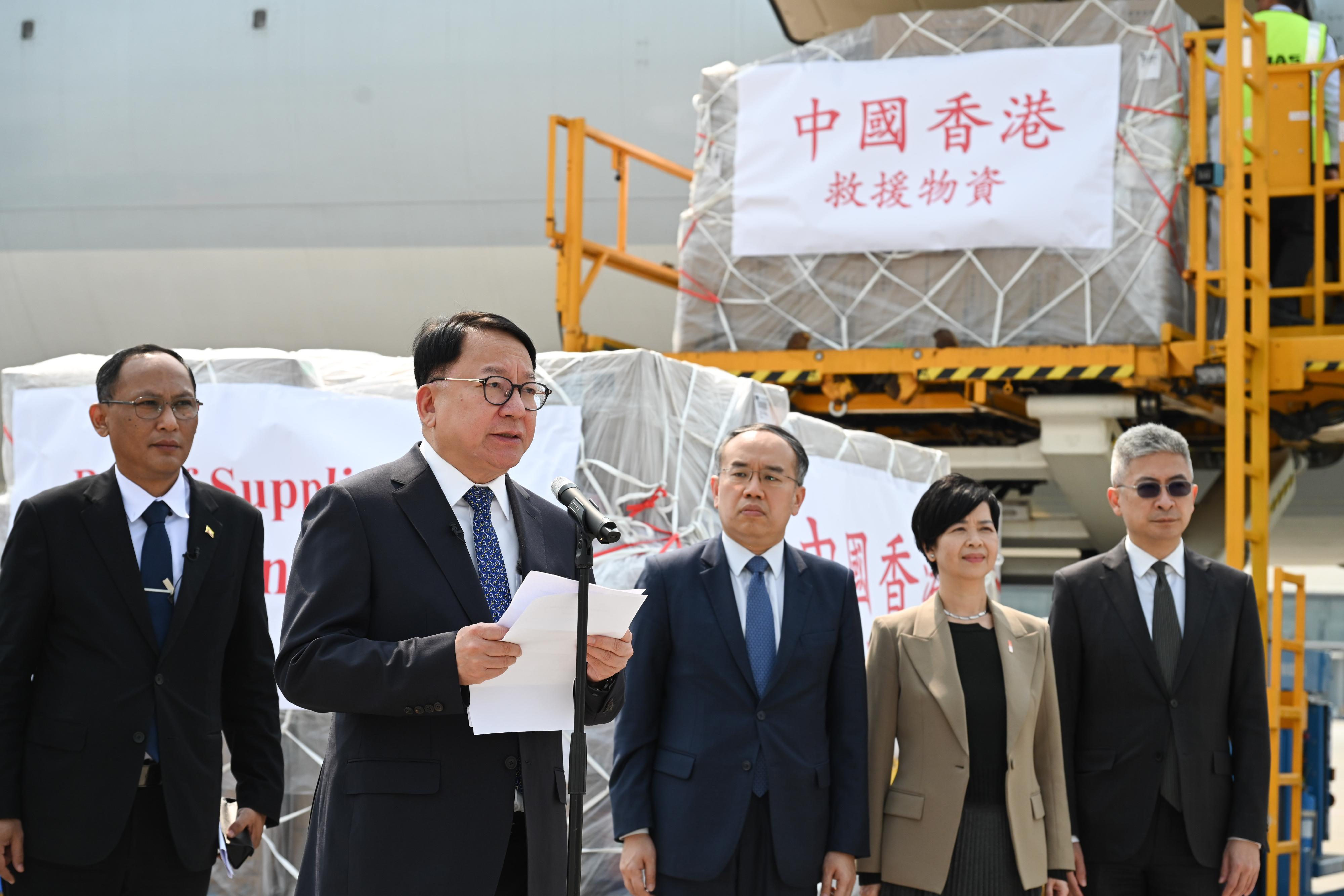The Chief Secretary for Administration, Mr Chan Kwok-ki, attended a donation ceremony at Hong Kong International Airport today (April 3) to hand over a batch of emergency relief supplies to the Consul-General of Myanmar in Hong Kong, and immediately arranged for their delivery to the disaster-stricken areas to meet the immediate needs of the people affected. Photo shows Mr Chan (second left) delivering his remarks at the donation ceremony.
