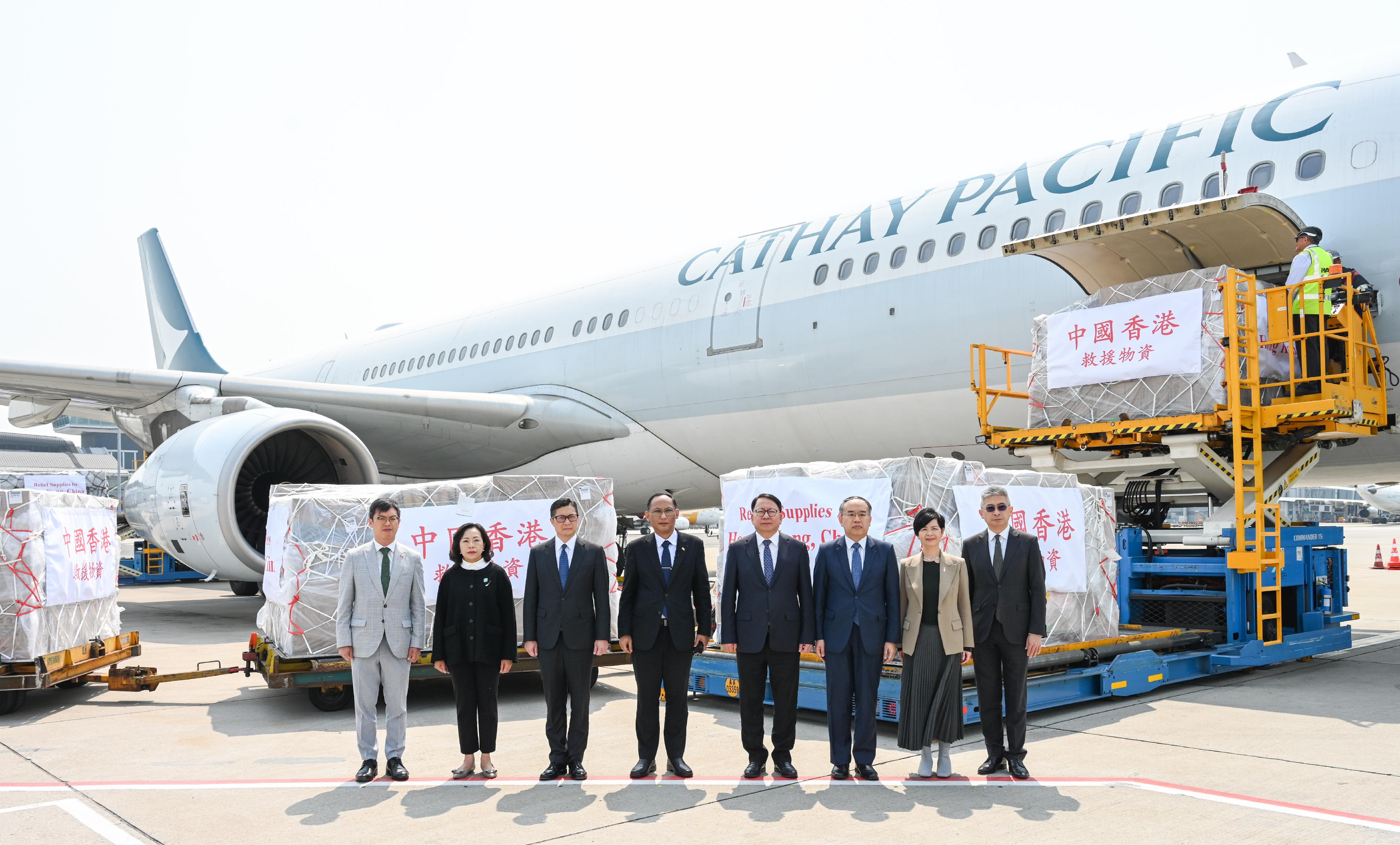 The Chief Secretary for Administration, Mr Chan Kwok-ki, attended a donation ceremony at Hong Kong International Airport today (April 3) to hand over a batch of emergency relief supplies to the Consul-General of Myanmar in Hong Kong, and immediately arranged for their delivery to the disaster-stricken areas to meet the immediate needs of the people affected. Photo shows (from left) the Under Secretary for Labour and Welfare, Mr Ho Kai-ming; the Secretary for Home and Youth Affairs, Miss Alice Mak; the Secretary for Security, Mr Tang Ping-keung; the Consul-General of Myanmar in Hong Kong, Mr Han Win Naing; Mr Chan; the Secretary for Financial Services and the Treasury, Mr Christopher Hui; the Secretary for Housing, Ms Winnie Ho; and the Acting Secretary for Culture, Sports and Tourism, Mr Raistlin Lau.