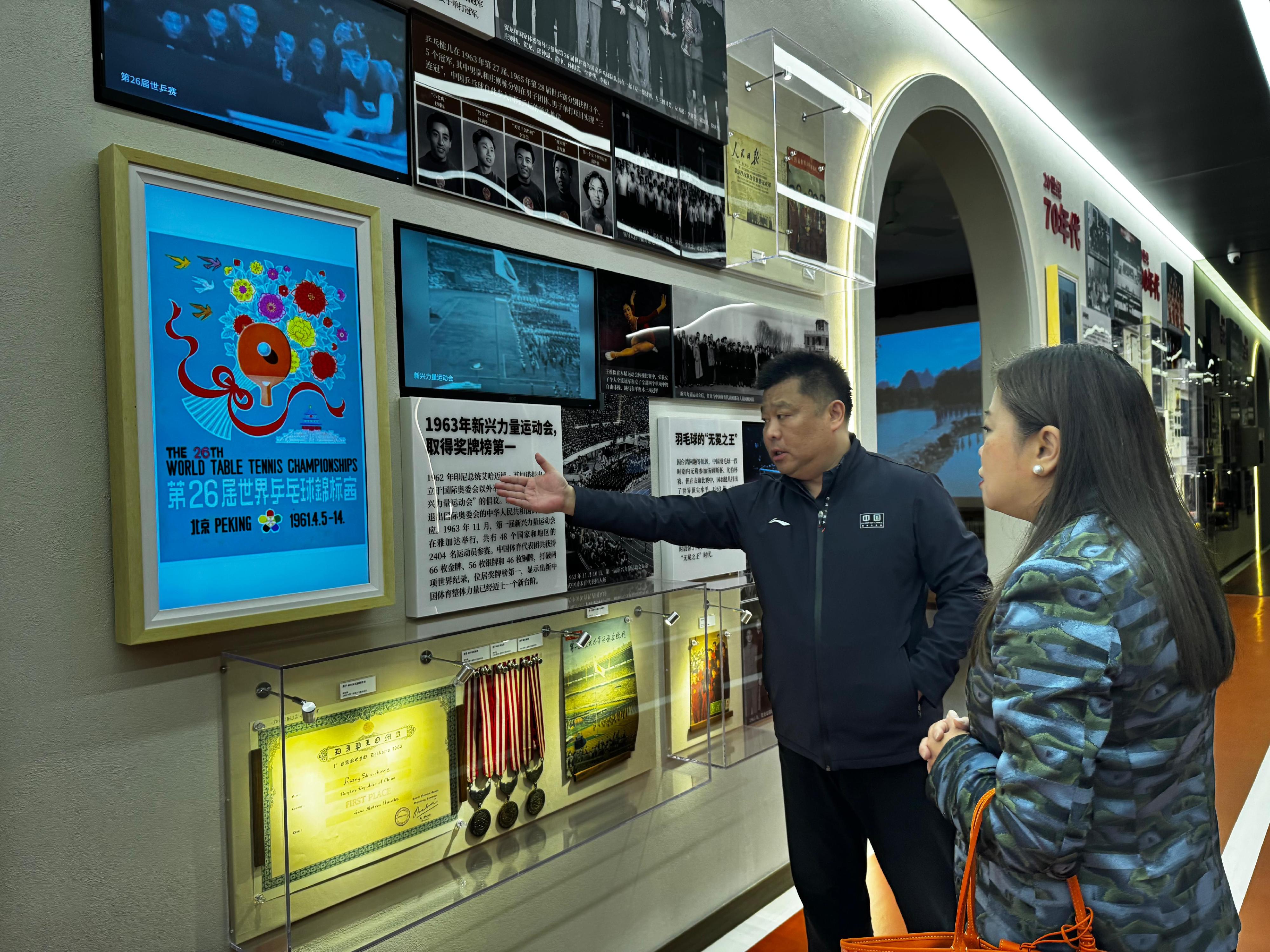 The Secretary for Culture, Sports and Tourism, Miss Rosanna Law (right), continued her visit to Beijing today (April 3). She visited the Hall of Honor of the Training Center of the General Administration of Sport of China in Beijing today (April 3) and was briefed by the Director of the Training Center of the General Administration of Sport of China, Mr Yang Xinli (left), on the exhibits.