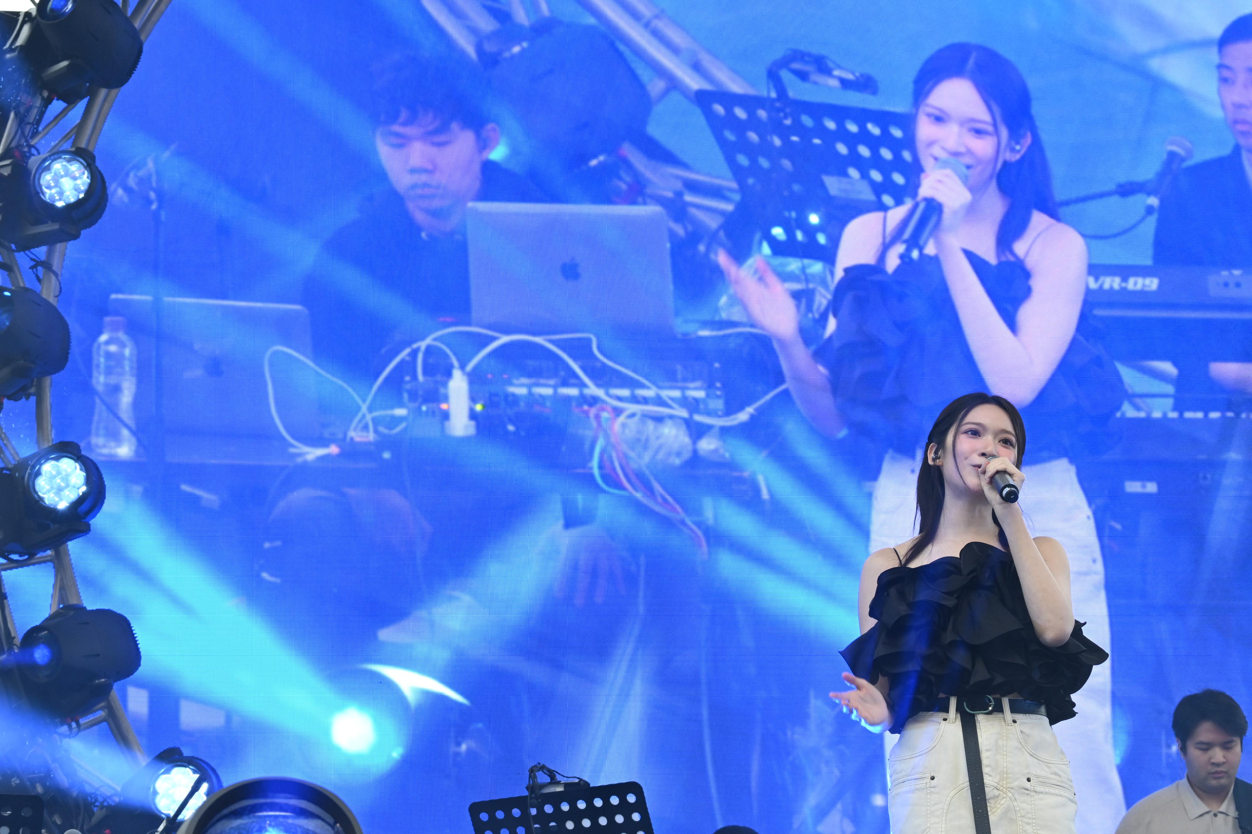 Outdoor music carnival "ImagineLand 2025", the highlight programme of the Hong Kong Pop Culture Festival 2025, is being held today and tomorrow (April 5 and 6) free of charge. Photo shows local pop singer Cloud performing at the "Go Beyond Concert".