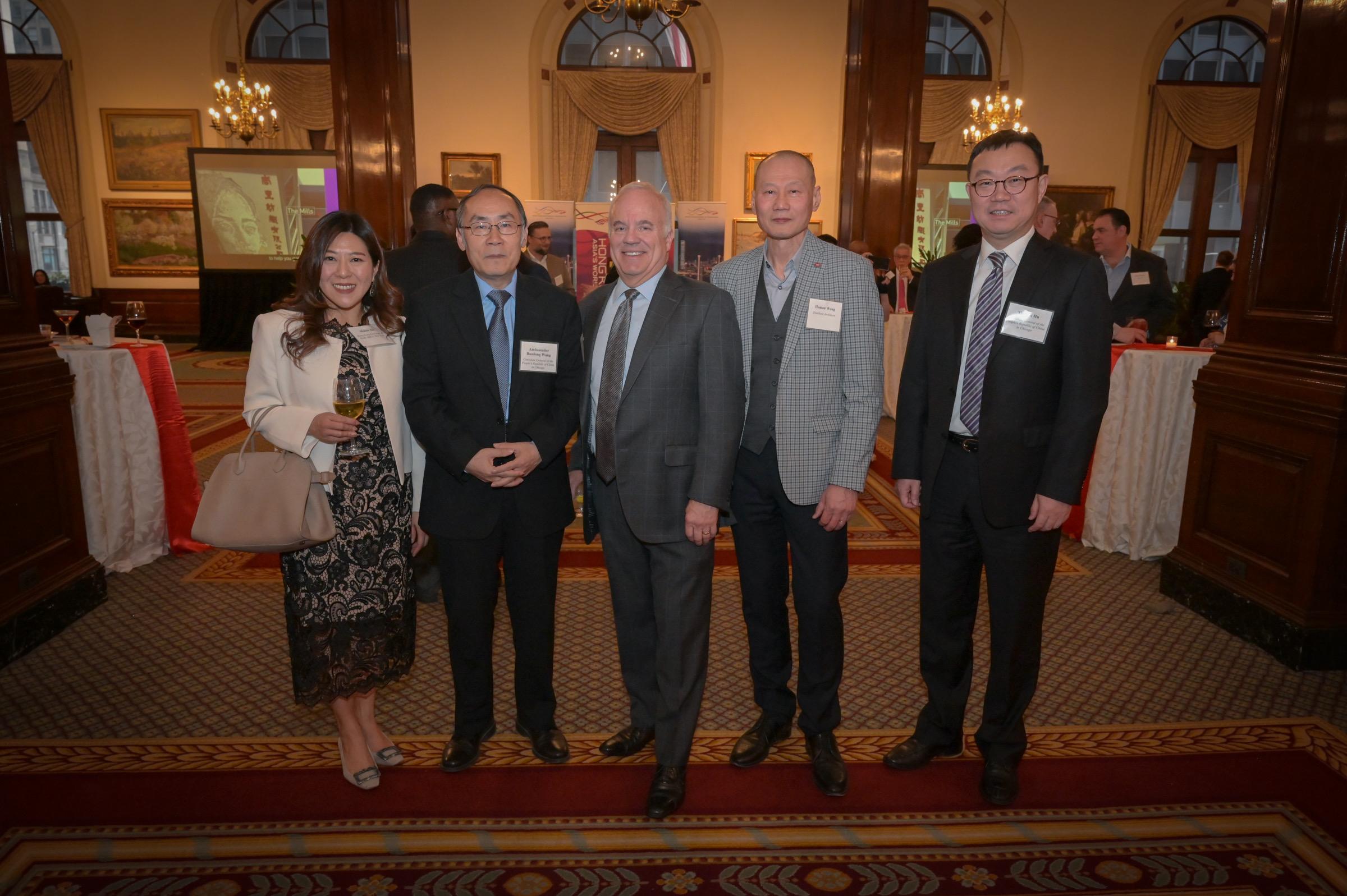 The Hong Kong Economic and Trade Office in New York (New York ETO) hosted its spring reception in Chicago on April 3 (Chicago time). Photo shows the Director of the New York ETO, Ms Maisie Ho (first left); the Consul General of the People’s Republic of China in Chicago, Mr Wang Baodong (second left), and other reception guests. 