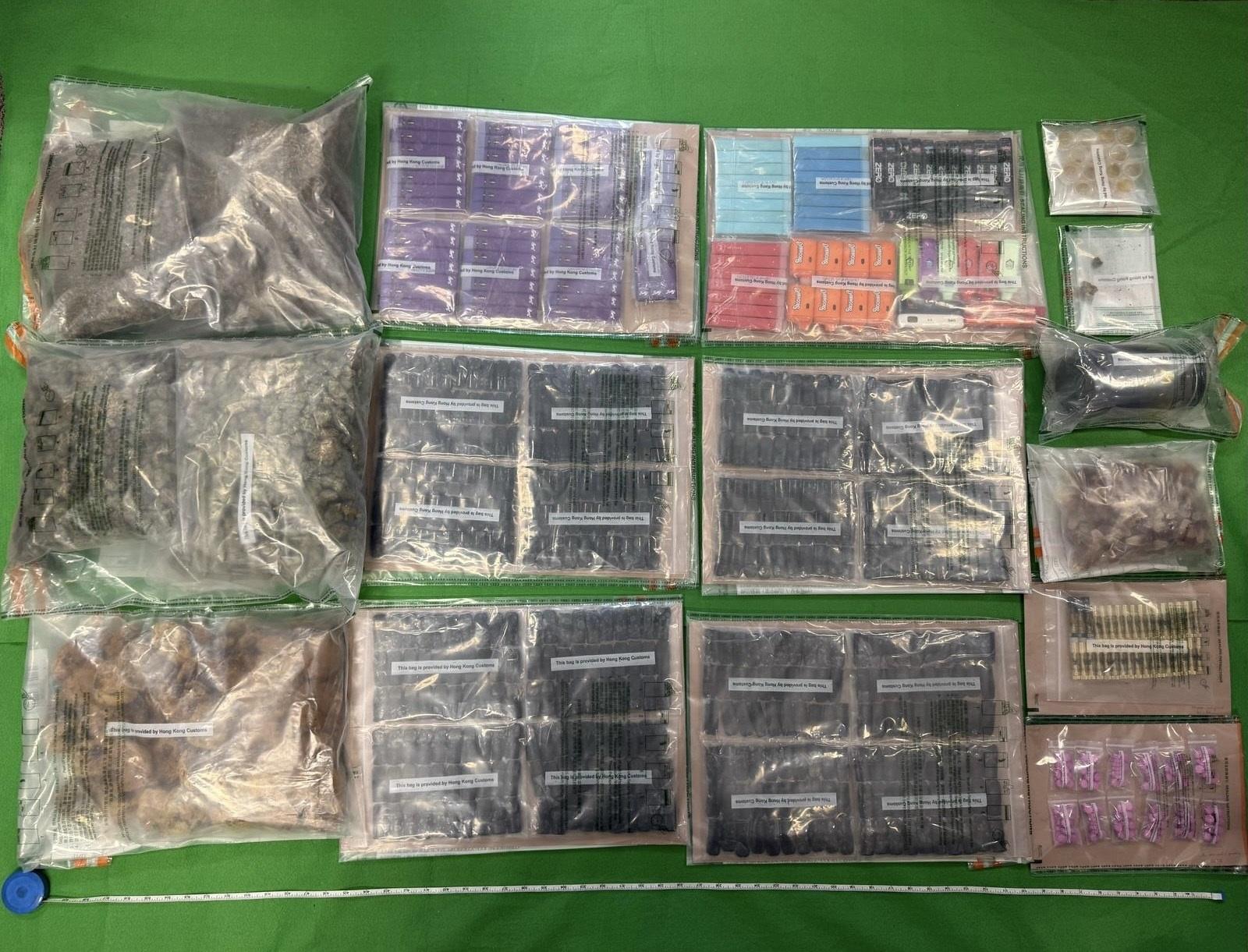 Hong Kong Customs yesterday (April 7) seized about 3.3 kilograms of suspected cannabis buds, a batch of suspected cannabis products and suspected MDMA tablets in Tai Po. The total estimated market value was about $1 million. Photo shows the suspected dangerous drugs seized.
