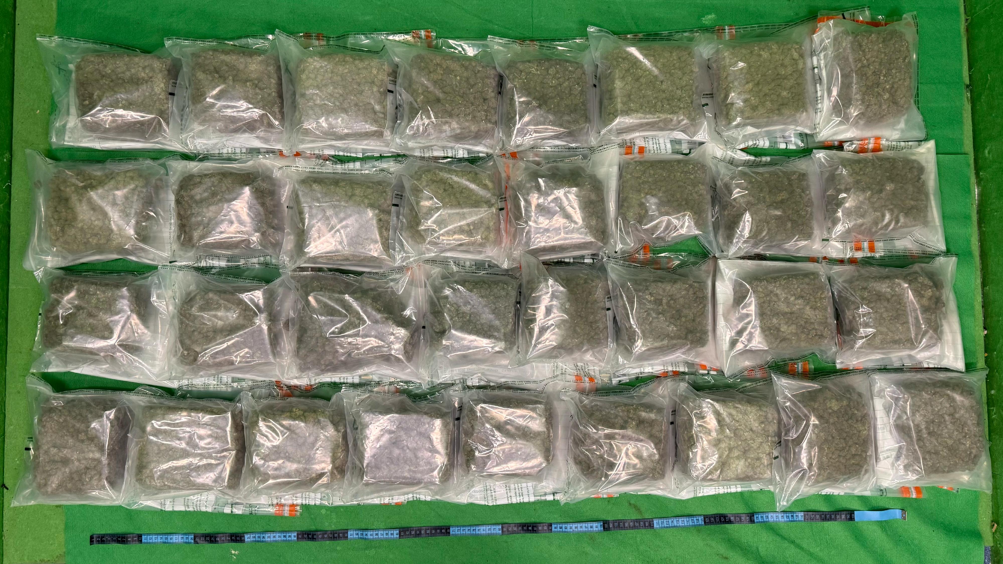 Hong Kong Customs yesterday (April 7) detected a drug trafficking case involving baggage concealment at Hong Kong International Airport and seized about 18 kilograms of suspected cannabis buds with an estimated market value of about $4 million. Photo shows the suspected cannabis buds seized.