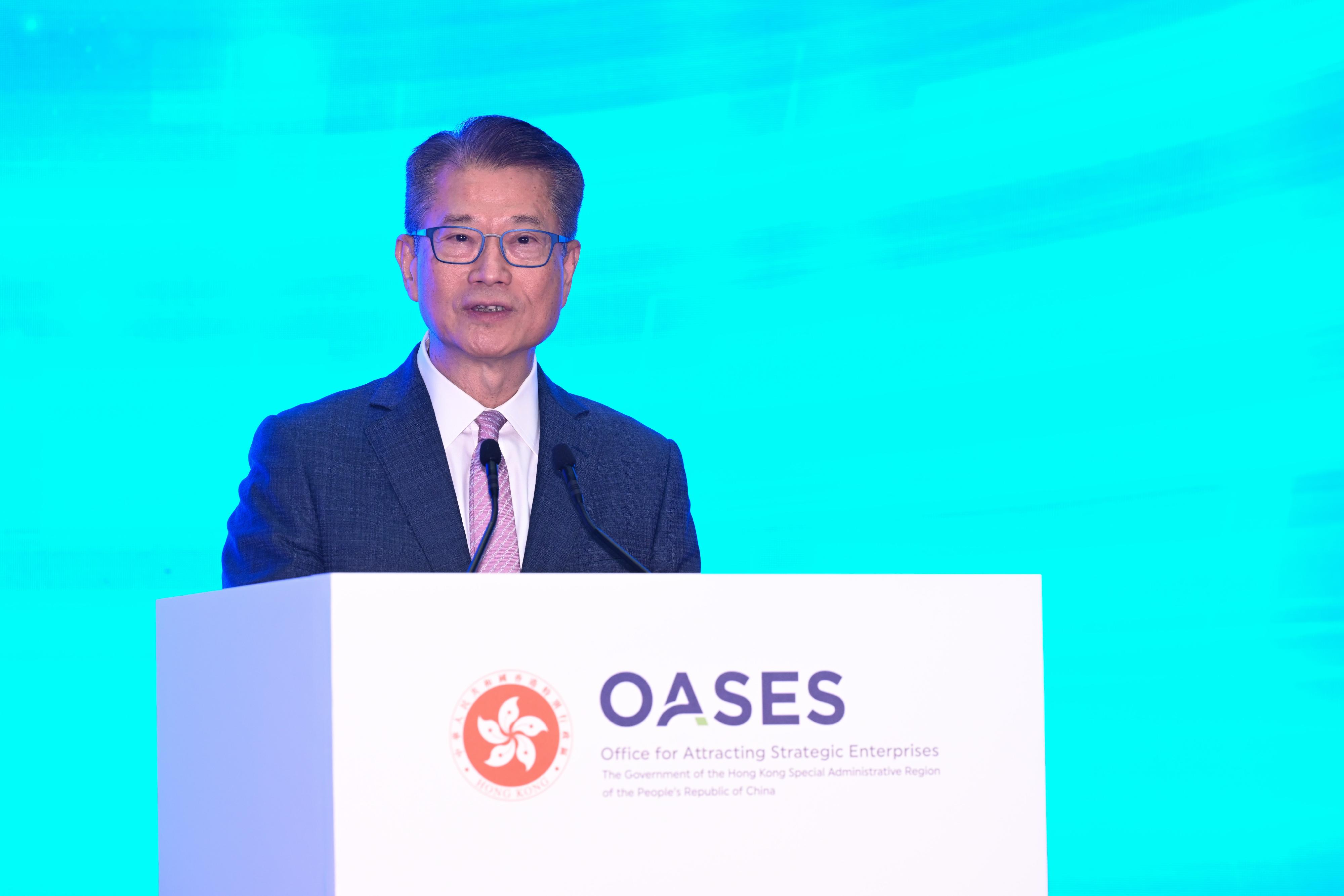 The Financial Secretary, Mr Paul Chan, speaks at the OASES Enterprises Signing Ceremony today (April 8).