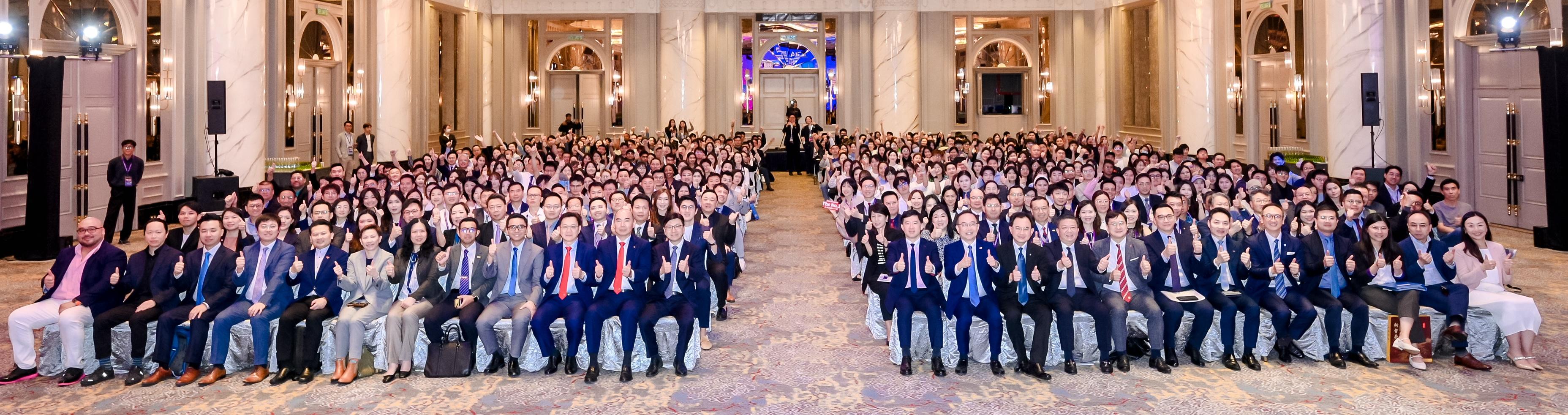 The Secretary for Labour and Welfare, Mr Chris Sun, visited Kuala Lumpur, Malaysia, from April 10 to 12. The Under Secretary for Constitutional and Mainland Affairs, Mr Clement Woo, and the Director of Hong Kong Talent Engage, Mr Anthony Lau, also joined the visit. Photo shows Mr Sun (front row, 12th left); Mr Woo (front row, 12th right); Mr Lau (front row, ninth right); and the Director-General of the Hong Kong Economic and Trade Office, Jakarta, Miss Libera Cheng (front row, sixth left), with other guests and attendees at the Symposium of the Guangdong-Hong Kong-Macao Greater Bay Area Talent Development Showcase today (April 12).