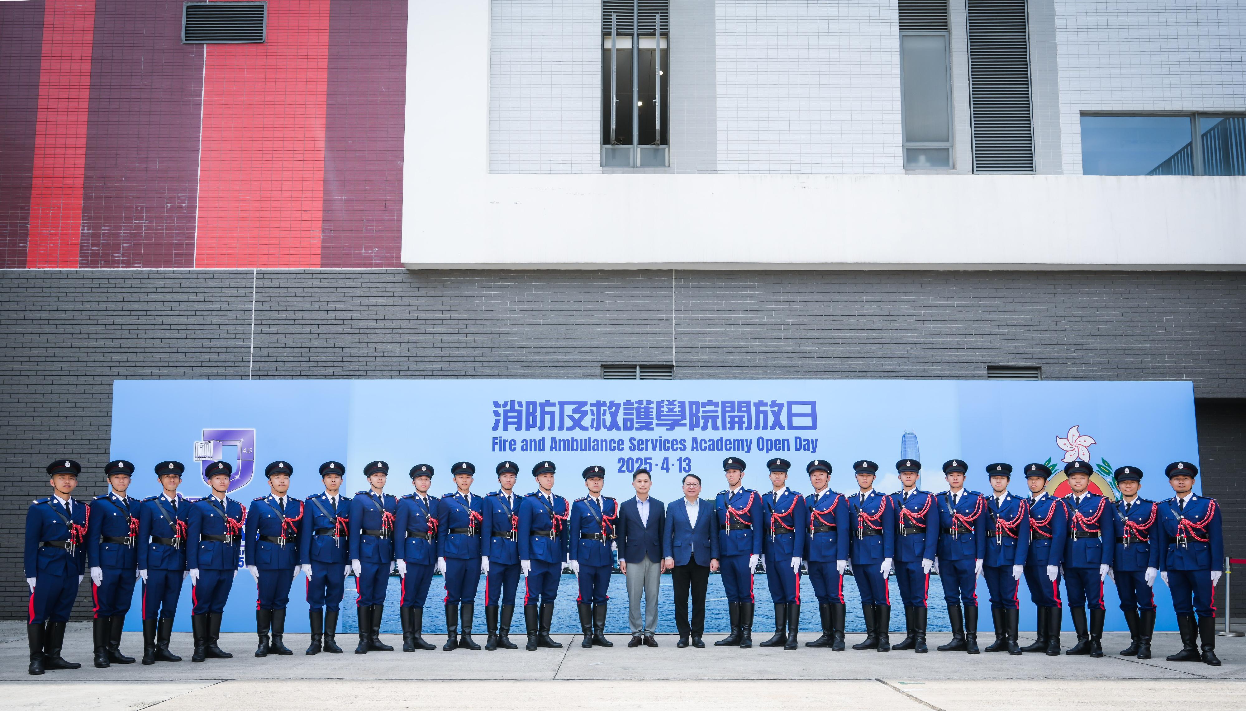 In response to and in support of the 10th National Security Education Day, the Fire Services Department (FSD) held an open day today (April 13) at the Fire and Ambulance Services Academy in Tseung Kwan O. Photo shows the Chief Secretary for Administration, Mr Chan Kwok-ki (12th right); the Director of Fire Services, Mr Andy Yeung (13th right), and the FSD's Guard of Honour.