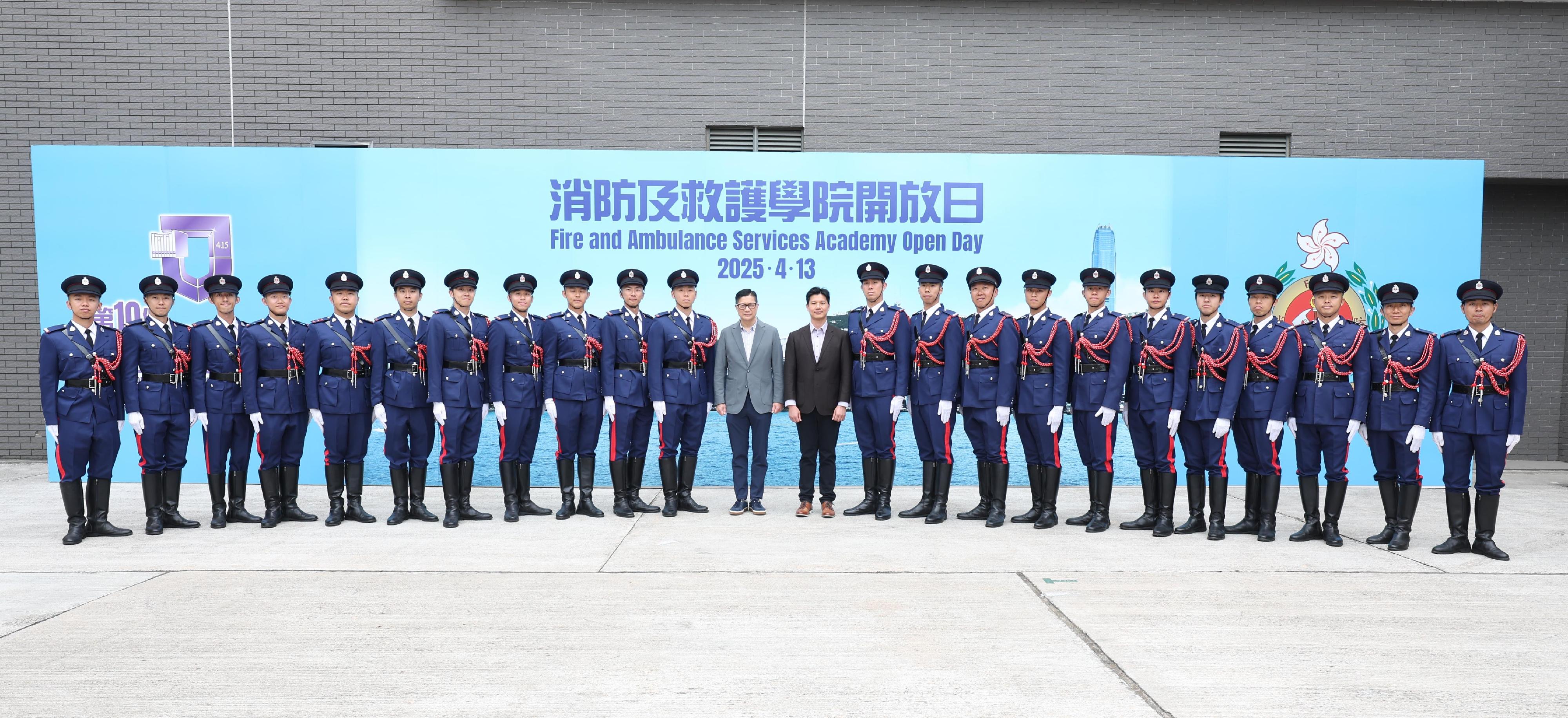 In response to and in support of the 10th National Security Education Day, the Fire Services Department (FSD) held an open day today (April 13) at the Fire and Ambulance Services Academy (FASA) in Tseung Kwan O. Photo shows the Secretary for Security, Mr Tang Ping-keung (twelve left), with the Commandant of the FASA, Mr Cheu Yu-kok (twelve right), and the FSD's Guard of Honour.