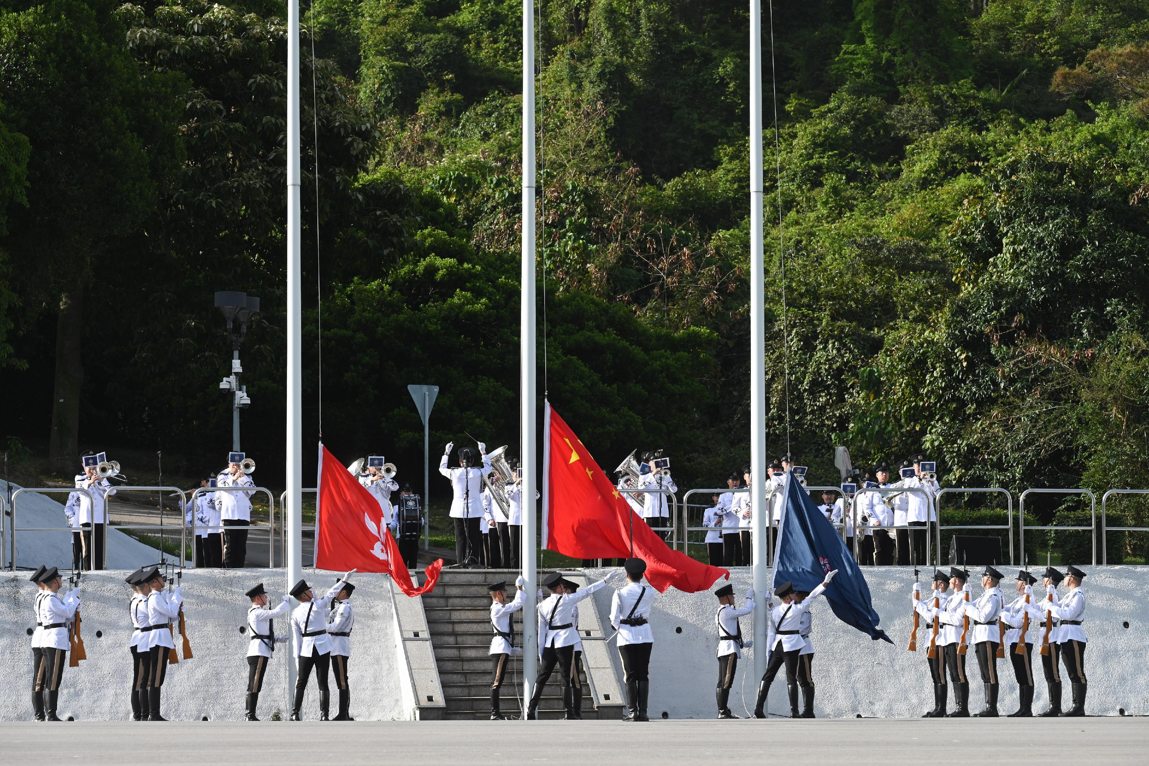The Security Bureau and its disciplined services jointly held a National Security Education Day flag-raising ceremony at the Hong Kong Police College today (April 15).