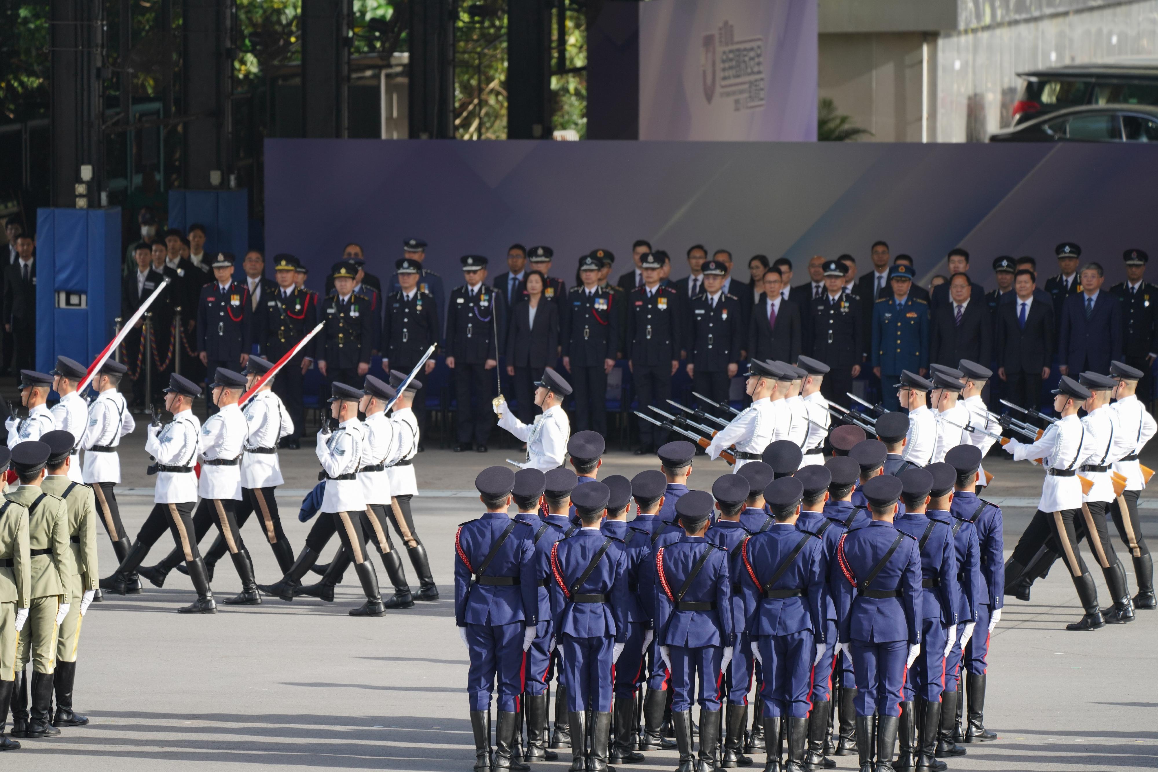 保安局及轄下紀律部隊今日（四月十五日）於香港警察學院聯合舉行「全民國家安全教育日」升旗儀式。圖示警察護旗方隊進場。