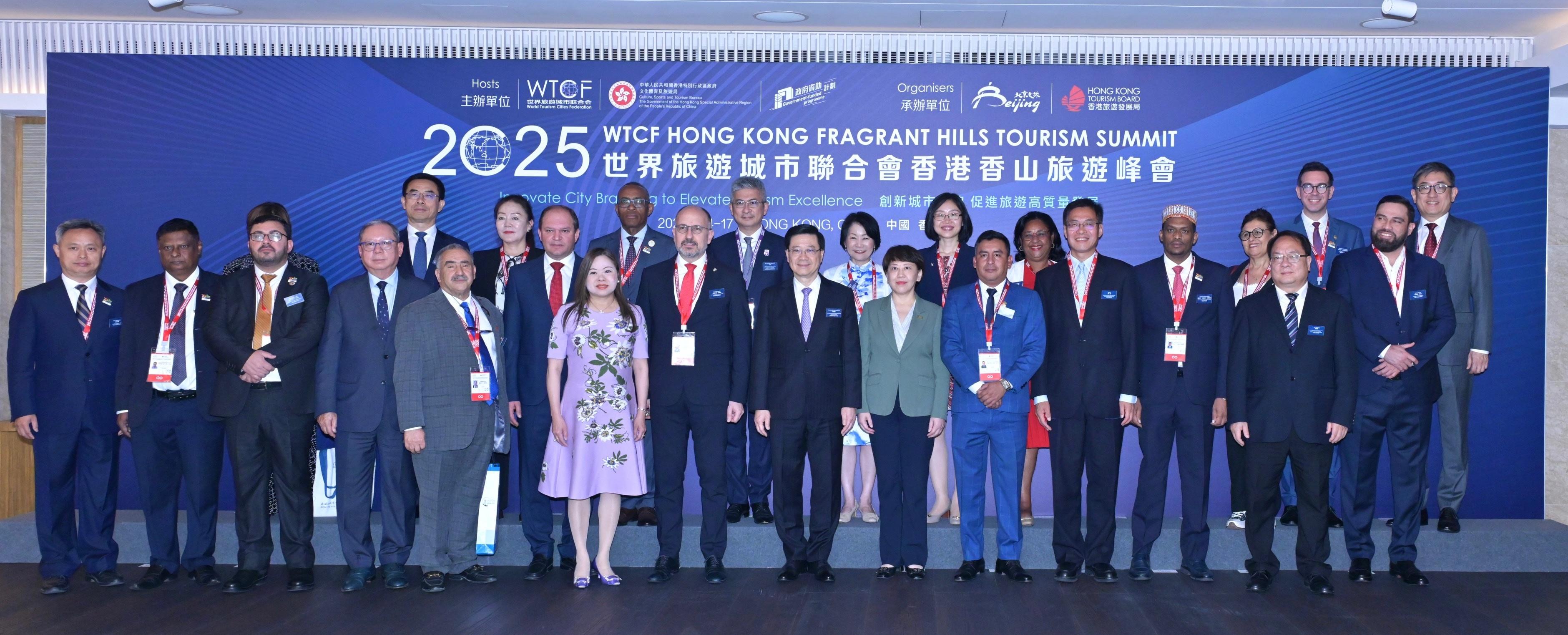 The Chief Executive, Mr John Lee, attended the 2025 World Tourism Cities Federation (WTCF) Hong Kong Fragrant Hills Tourism Summit today (April 15). Photo shows Mr Lee (front row, seventh right); the Governor of Asti Province and Mayor of Asti City, Italy, Mr Maurizio Rasero (front row, centre); Vice Mayor of Beijing Municipality and Executive Vice-Chair of the WTCF Council, Ms Sima Hong (front row, sixth right); Deputy Director of the Liaison Office of the Central People's Government in the Hong Kong Special Administrative Region (HKSAR) Mr Qi Bin (front row, fourth right); Deputy Commissioner of the Office of the Commissioner of the Ministry of Foreign Affairs of the People's Republic of China in the HKSAR Mr Pan Yundong (front row, second right); and the Secretary for Culture, Sports and Tourism, Miss Rosanna Law (front row, seventh left), with other guests.