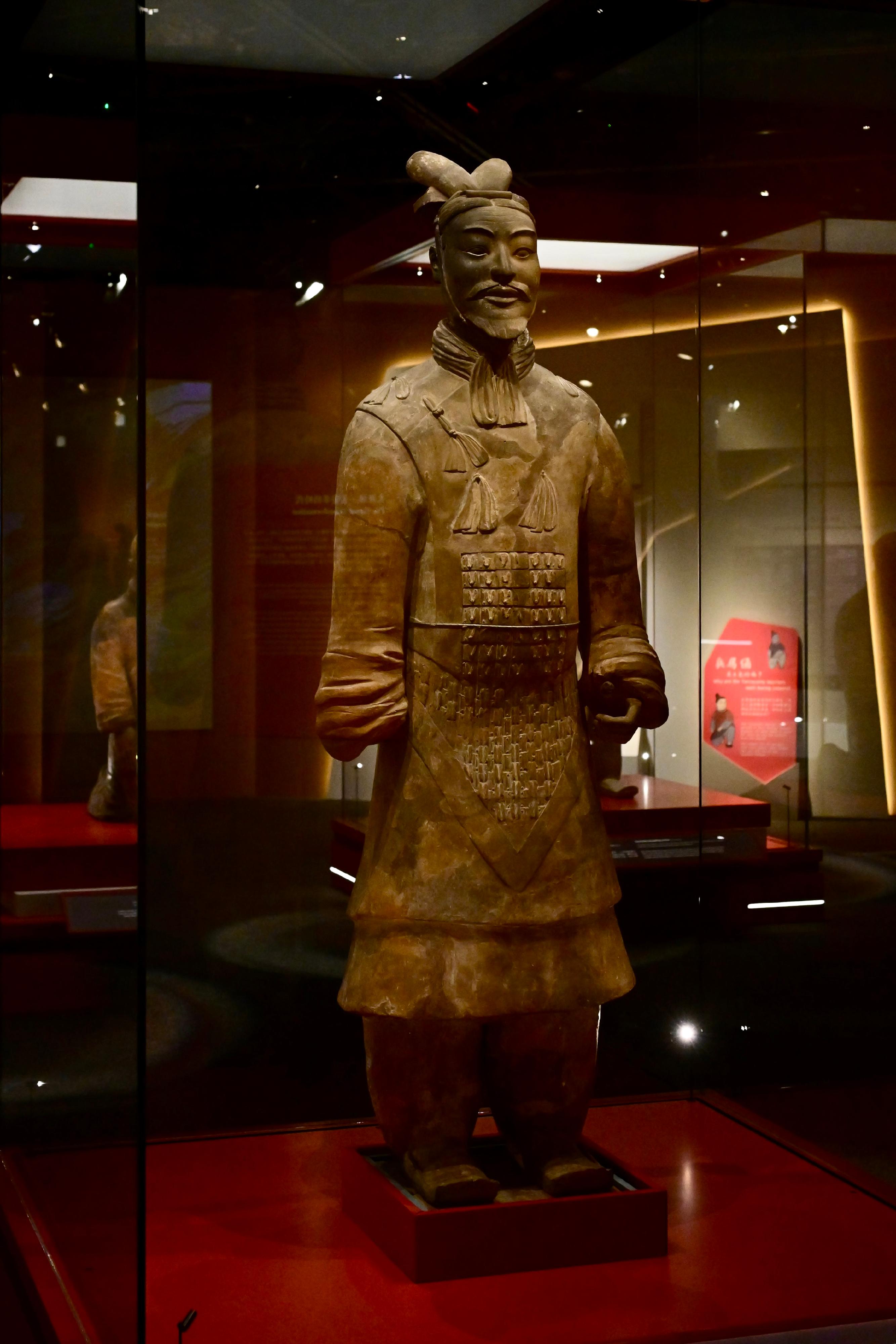 The Hong Kong Museum of History’s "The Hong Kong Jockey Club Series: The Great Unity - Civilisation of the Qin and Han Dynasties in Shaanxi Province" exhibition will be open to the public from tomorrow (April 16). Photo shows grade-one national treasure Terracotta General, the highest-ranking warrior yet uncovered at the Terracotta Army Pits, unearthed from Pit No. 1 of the Terracotta Army, Mausoleum site of Emperor Qin Shihuang, Xi’an City, Shaanxi Province, from a collection of Emperor Qinshihuang’s Mausoleum Site Museum. It is on its first display in Hong Kong. It wears a tail-shaped headpiece, a double-layered battle coat under a painted fish-scale like armour, and square-fronted shoes.