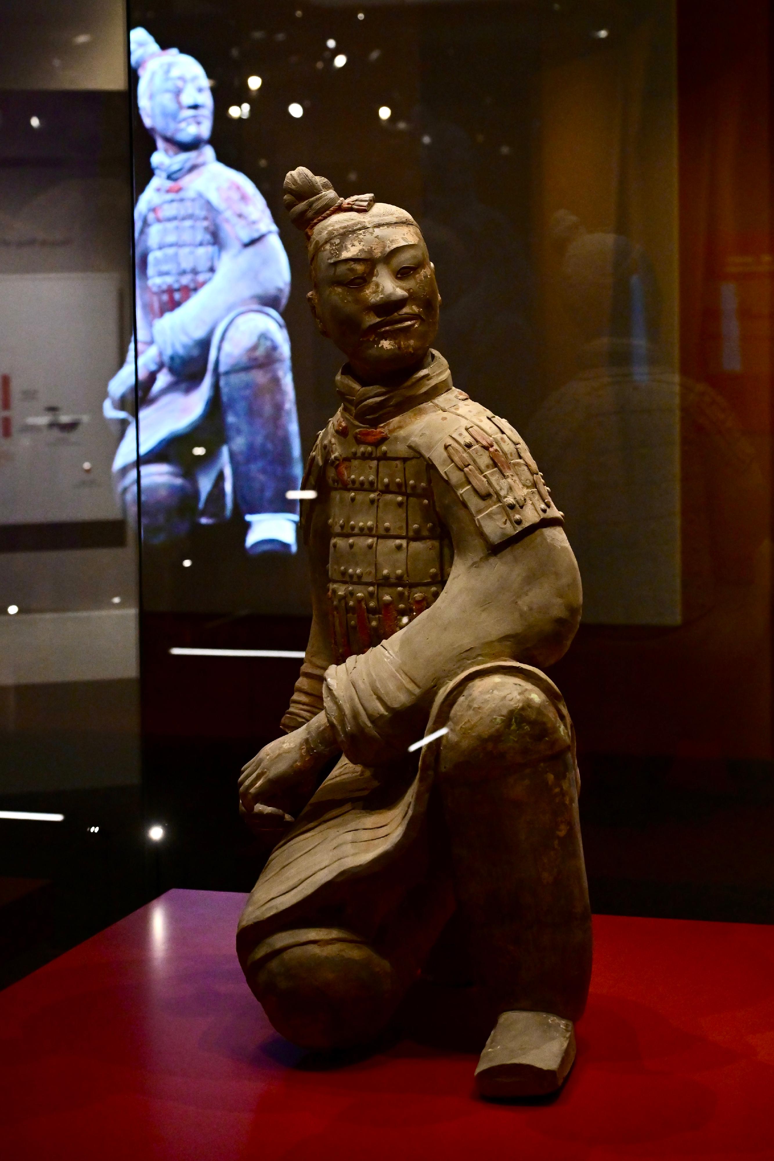 The Hong Kong Museum of History’s "The Hong Kong Jockey Club Series: The Great Unity - Civilisation of the Qin and Han Dynasties in Shaanxi Province" exhibition will be open to the public from tomorrow (April 16). Photo shows grade-one national treasure Terracotta Kneeling Archer, which is on its first display in Hong Kong, unearthed from Pit No. 2 of the Terracotta Army, Mausoleum site of Emperor Qin Shihuang, Xi’an City, Shaanxi Province from a collection of Emperor Qinshihuang’s Mausoleum Site Museum. It represents a crossbow soldier, with a coiled hairstyle, a battle robe, armour on the upper body and arms, square-toed shoes, and hands positioned as if holding a crossbow. Traces of red pigment applied by craftsmen over 2 000 years ago can still be seen on the armour.