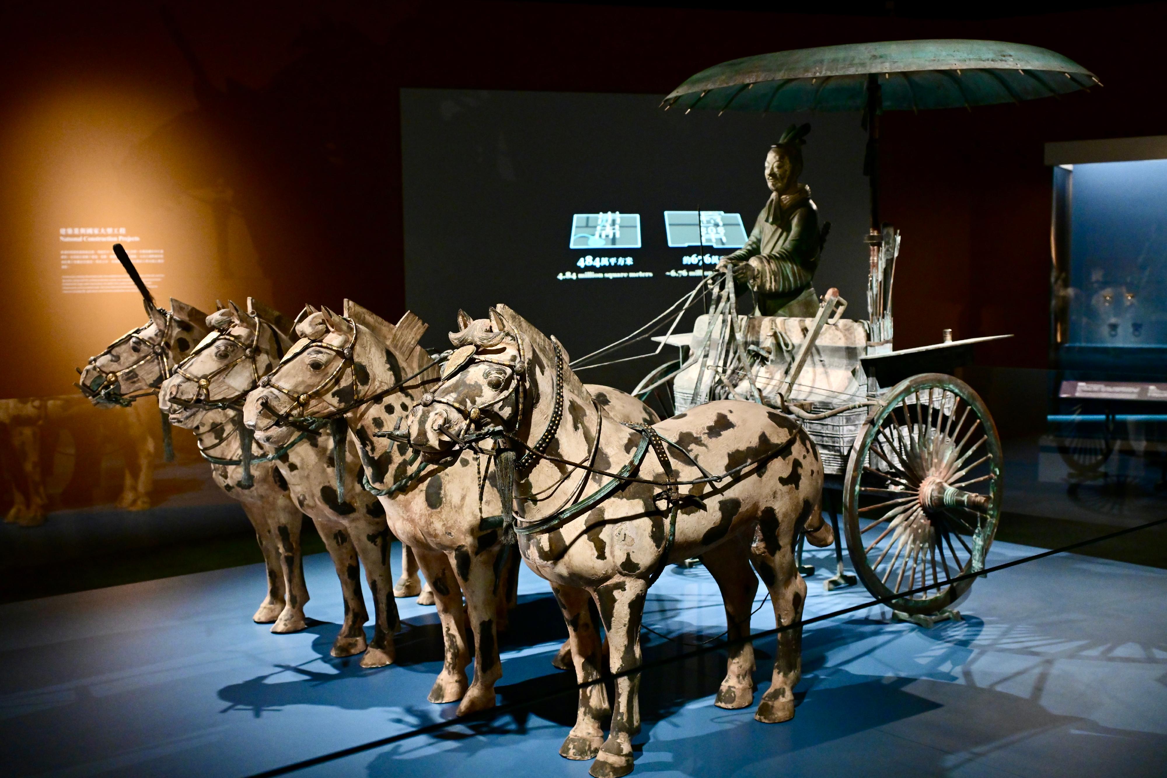 The Hong Kong Museum of History's "The Hong Kong Jockey Club Series: The Great Unity - Civilisation of the Qin and Han Dynasties in Shaanxi Province" exhibition will be open to the public from tomorrow (April 16). Photo shows Bronze chariot No. 1 (replica), the largest piece/set of exhibit for open display in the exhibition. Its original was unearthed from the Mausoleum site of Emperor Qin Shihuang, Xi'an City, Shaanxi Province, from a collection of Emperor Qinshihuang’s Mausoleum Site Museum. Between the two painted bronze chariots unearthed from the pit, Bronze chariot No. 1, in front, is a single-shaft chariot with two large wheels and powered by four mighty horses. It is half the size of a real chariot and authentically replicates the form and structure of ancient chariot.