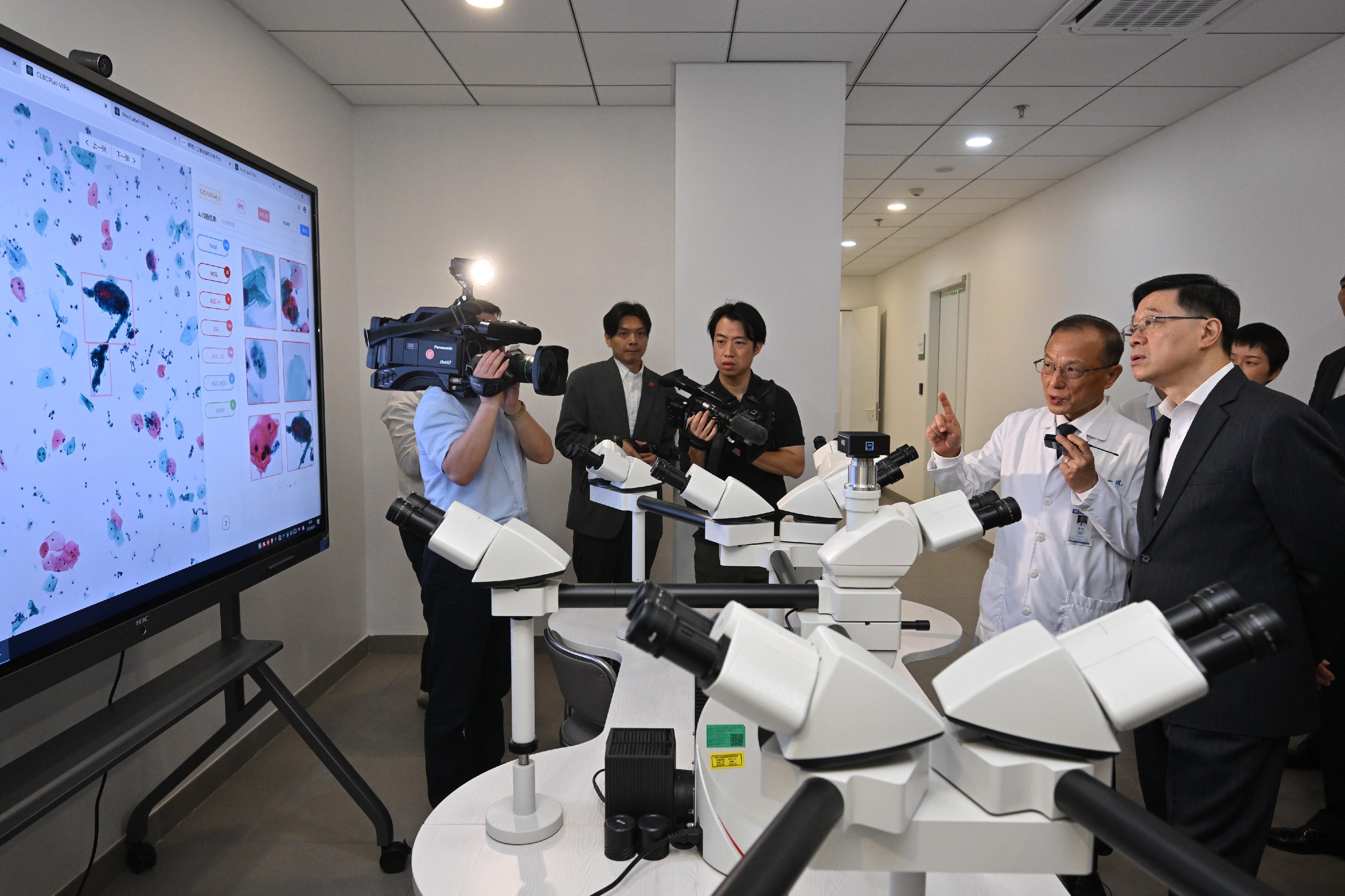 The Chief Executive, Mr John Lee, continued his visit to Hangzhou today (April 23). Photo shows Mr Lee (first right) visiting the headquarters of the First Affiliated Hospital, Zhejiang University School of Medicine.