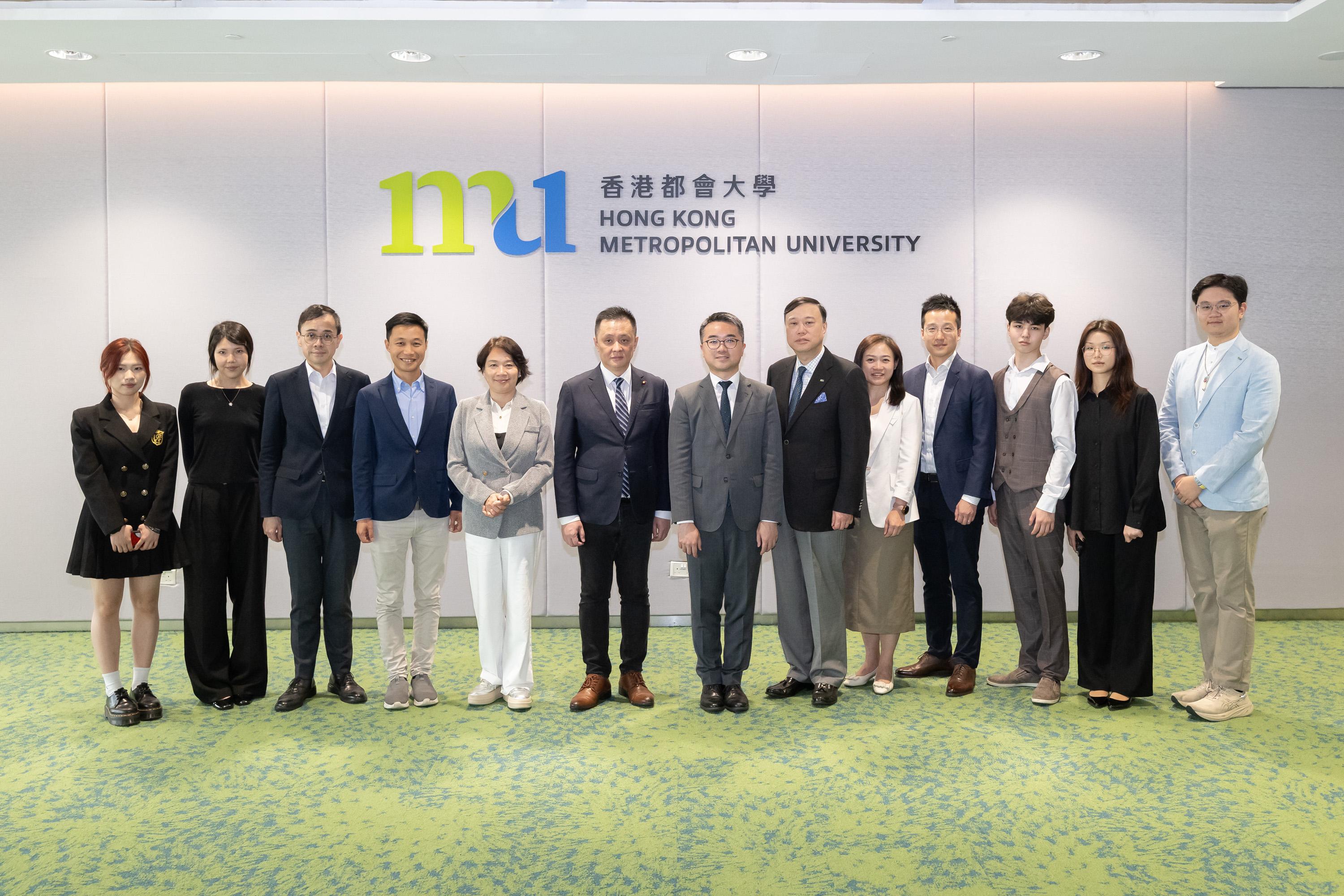 The Legislative Council (LegCo) Subcommittee on Promoting the Development of Hong Kong into an International Education Hub visits Hong Kong Metropolitan University (HKMU) today (April 23) to learn about the important role played by vocational and professional education and training in developing Hong Kong into an international post-secondary education hub. Members posed for a group photo with the Under Secretary for Education, Dr Jeff Sze (centre), HKMU Vice President (Strategic Initiatives), Professor Alan Au (sixth right) and non-local student representatives, etc.
